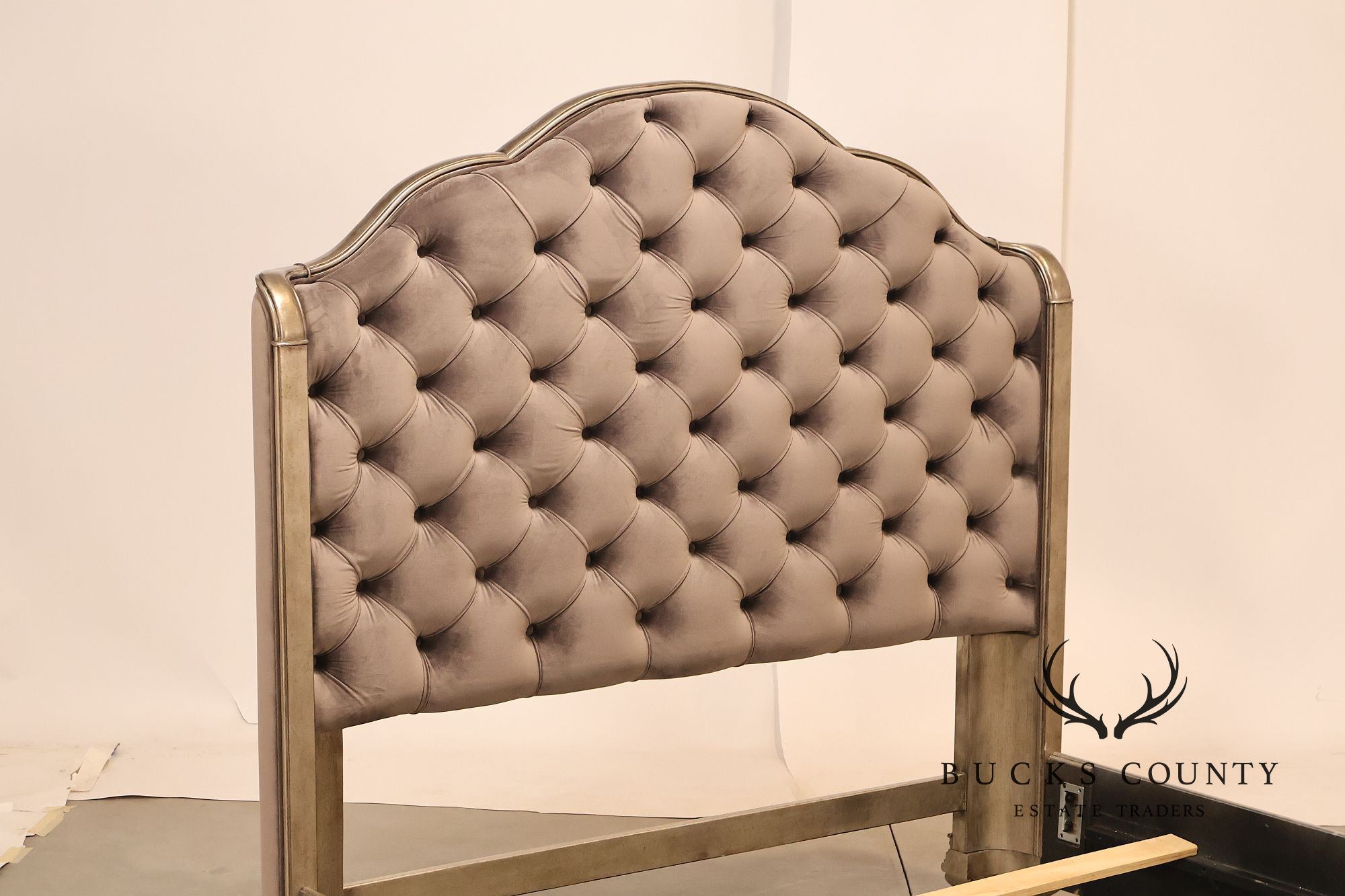 Elegant Queen Bed Featuring a Deep Tufted Upholstered Head and Footboard