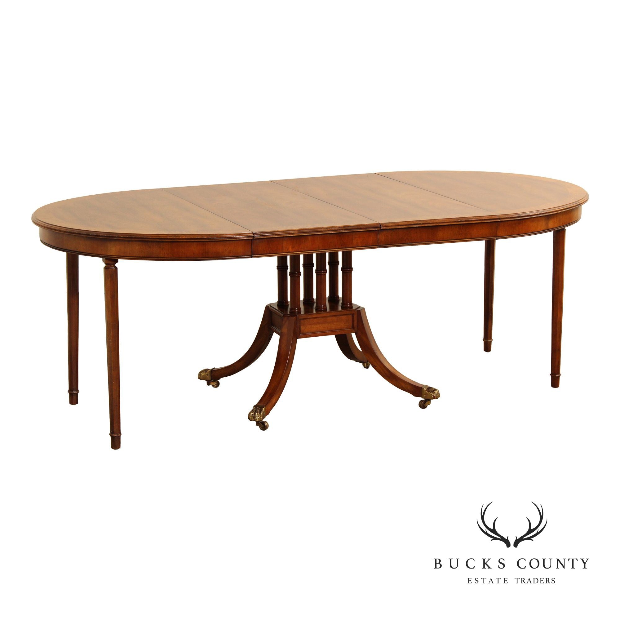 Union-National Inc. Regency Style Round Banded Mahogany Extendable Dining Table