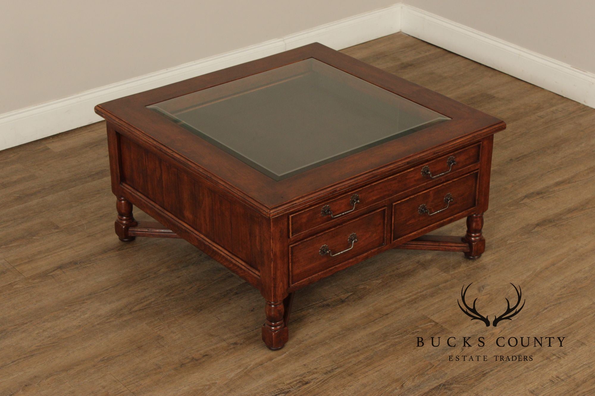 Bausman & Co. Glass Top Storage Coffee Table