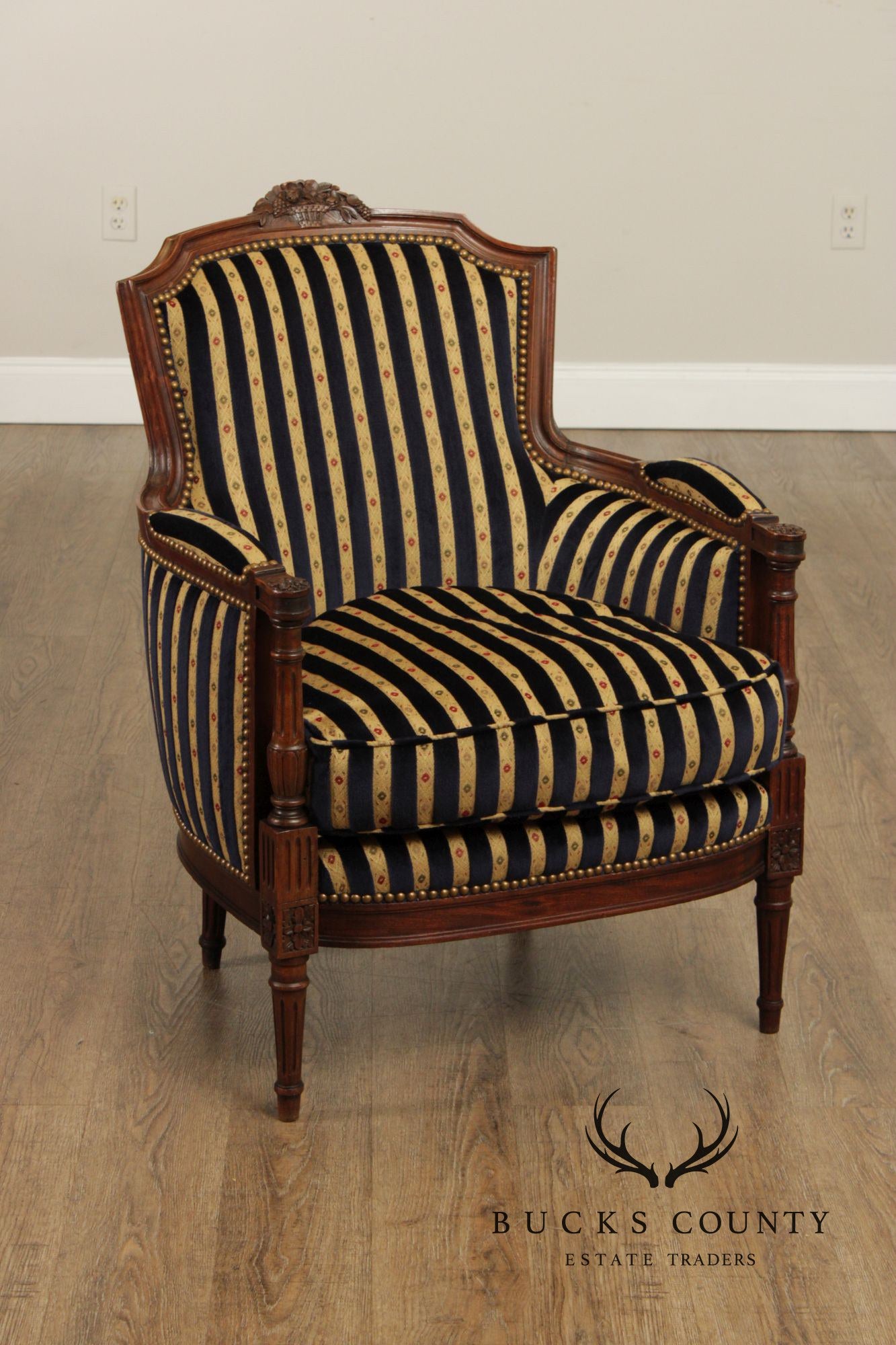 French Louis XVI Style Pair of Carved Walnut Bergere Armchairs