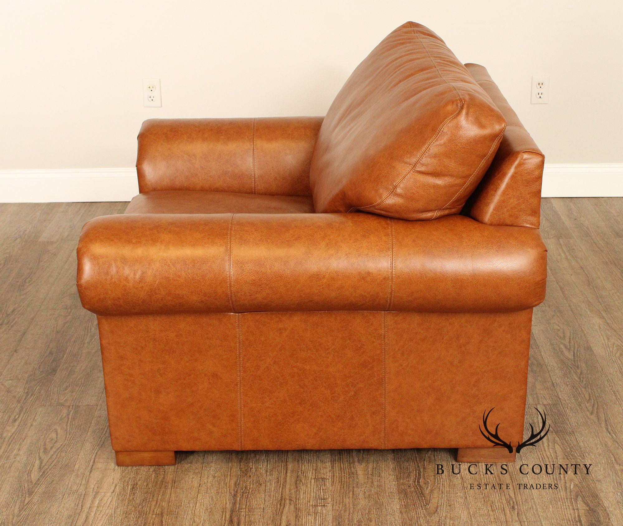 Leather Upholstered Chair & Ottoman