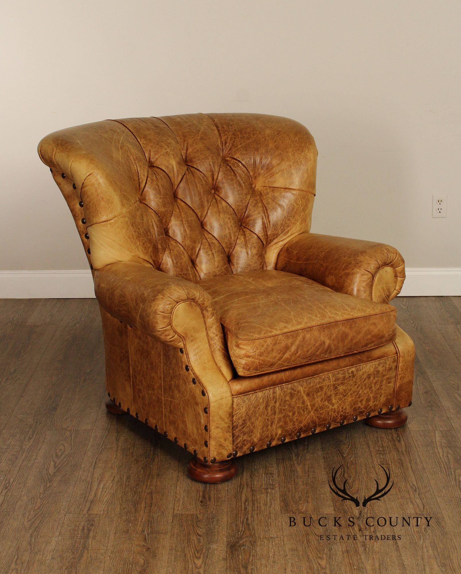 English Traditional Style Pair of Tufted Leather Armchairs and Ottoman