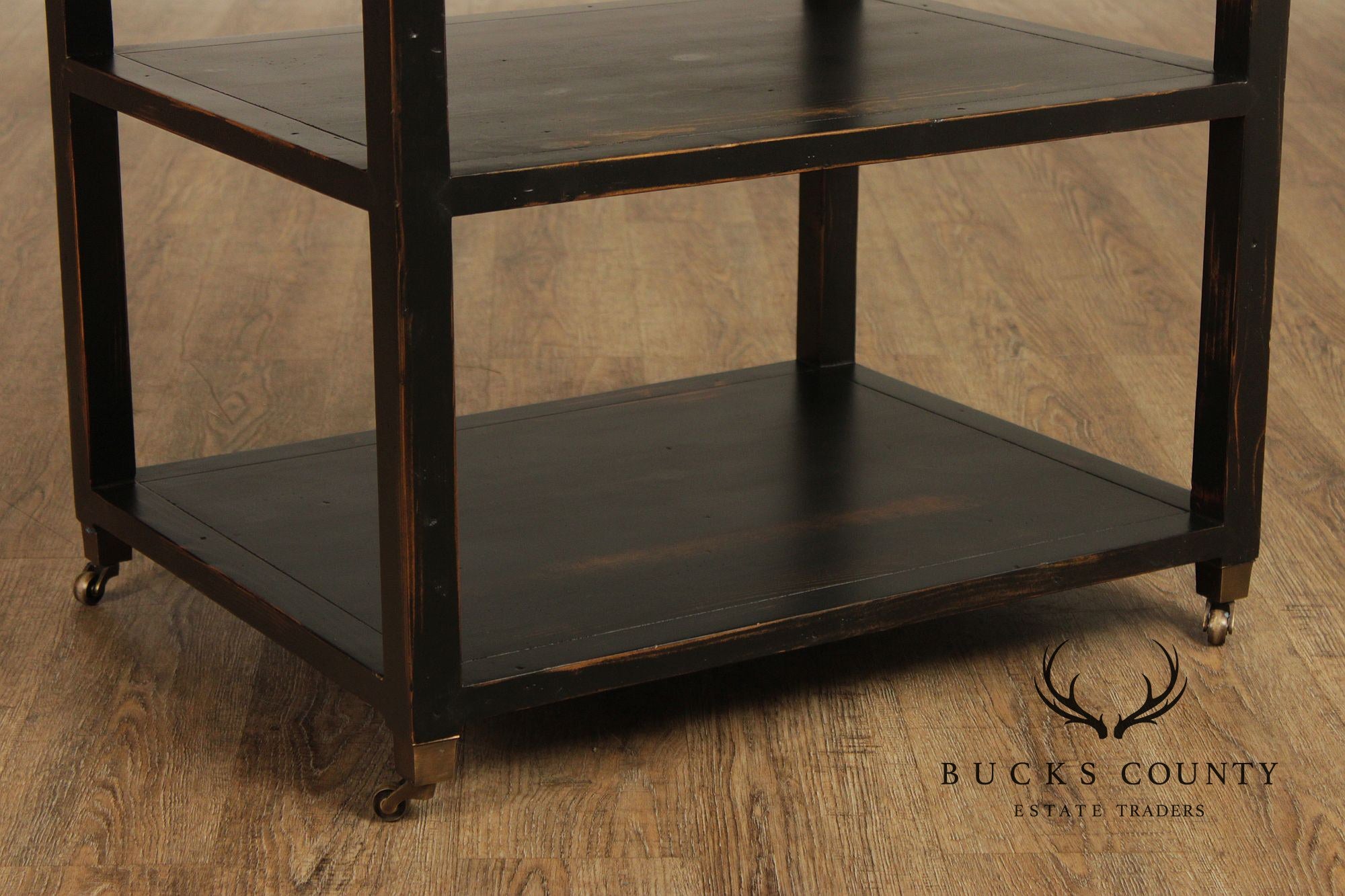 Industrial Style Pair of Ebonized Rolling End Tables