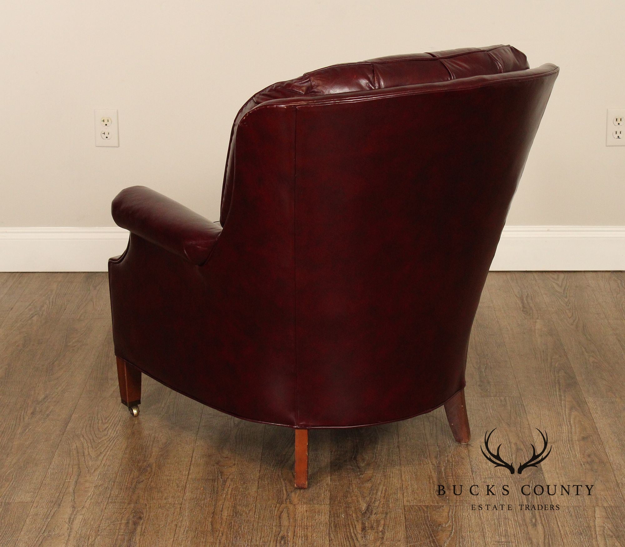 NORTH HICKORY OXBLOOD TUFTED LEATHER CHAIR AND OTTOMAN