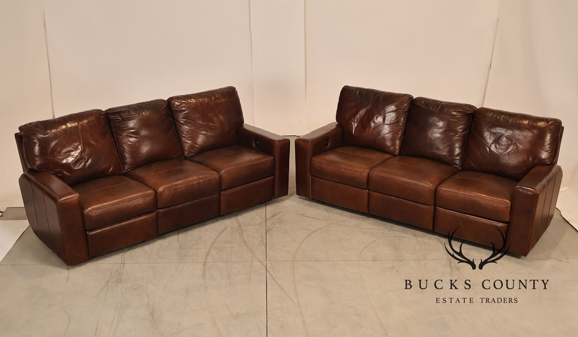 Soft Line Pair of 'Energia' Leather Power Reclining Sofas