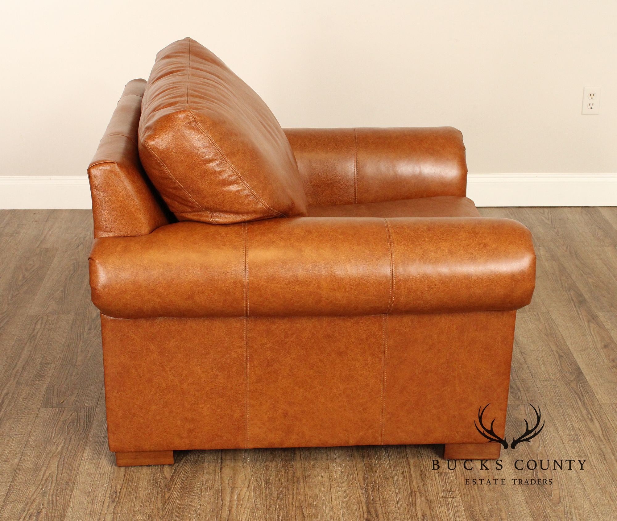 Leather Upholstered Chair & Ottoman