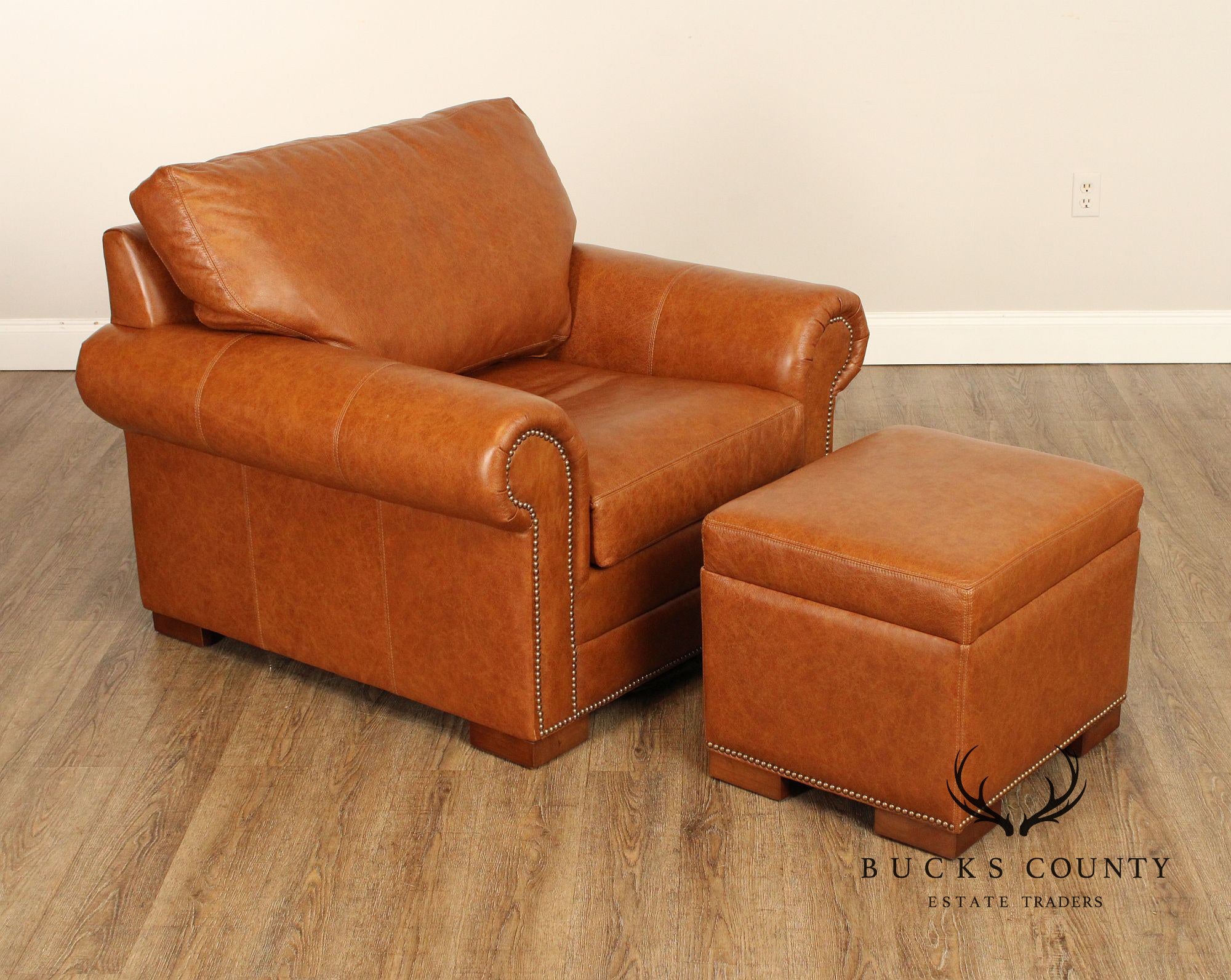 Leather Upholstered Chair & Ottoman