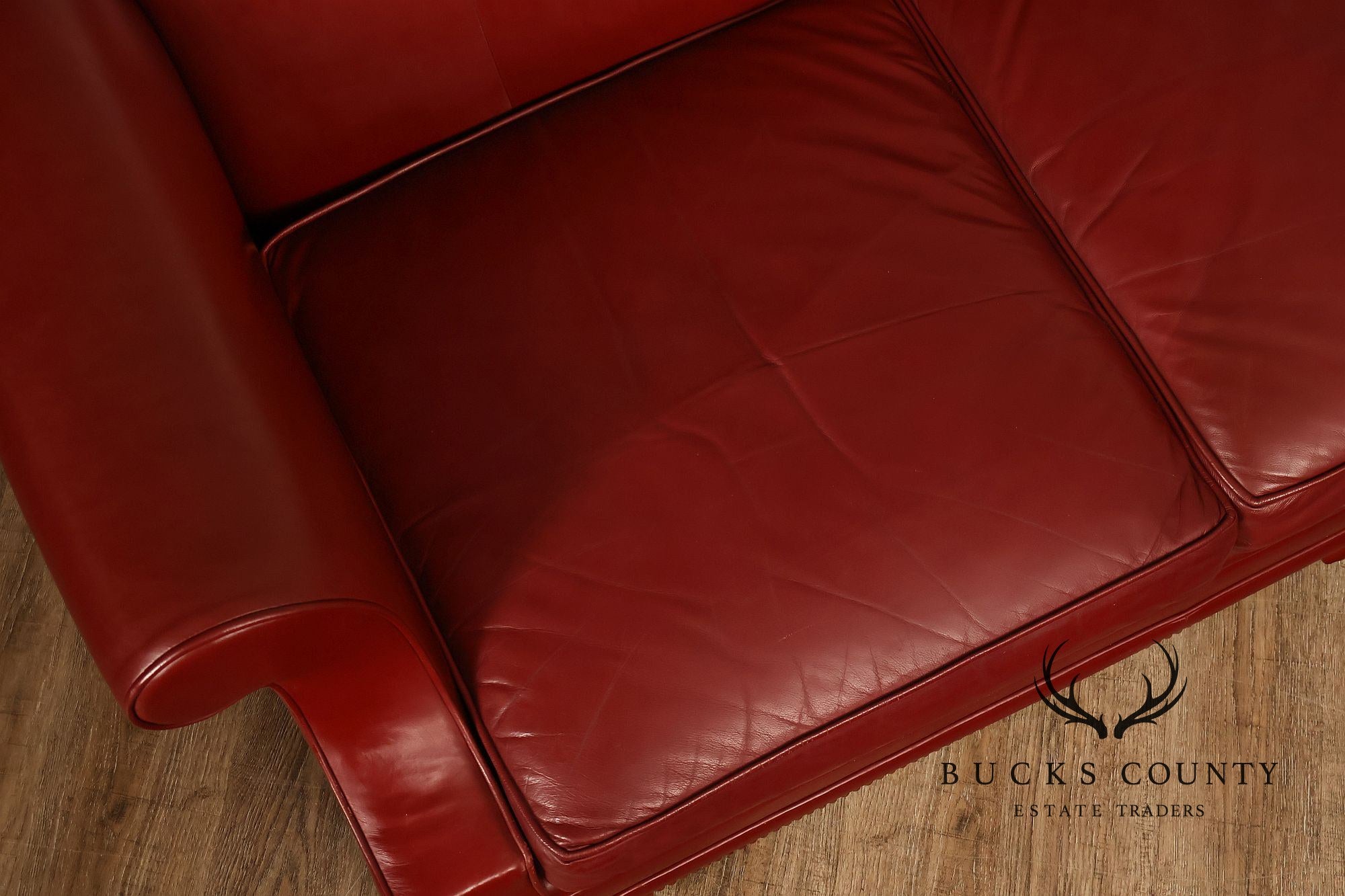 Kindel Vintage Camelback Back Leather Three Cushion Sofa