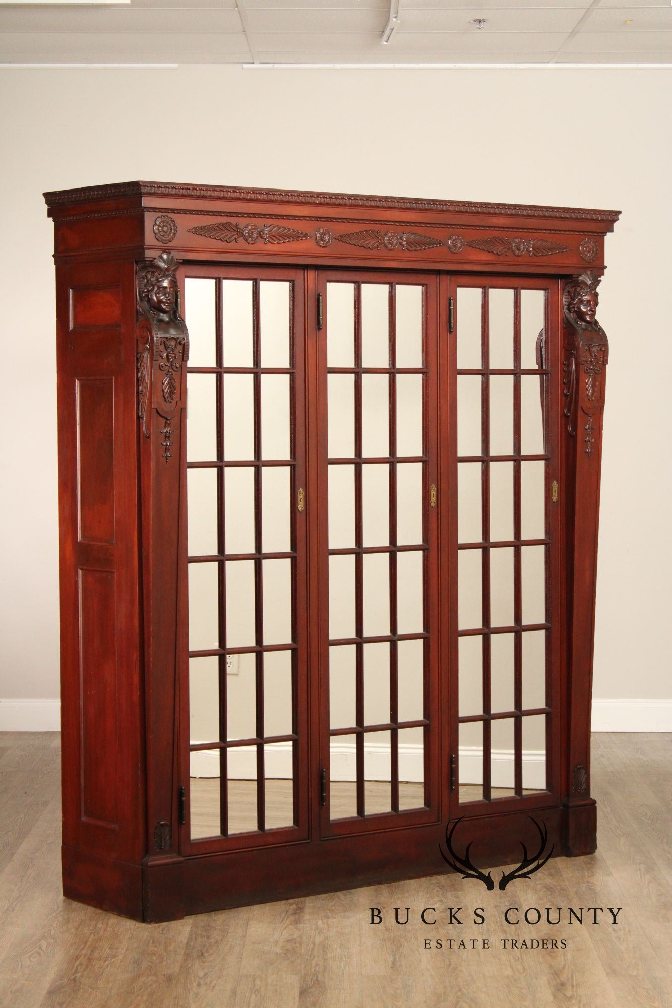 Antique Empire Revival Carved Mahogany Bookcase
