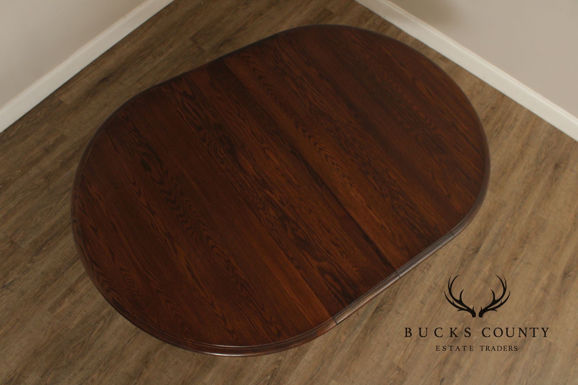 Conant Ball Round Oak Single Pedestal Dining Table With Two Leaves