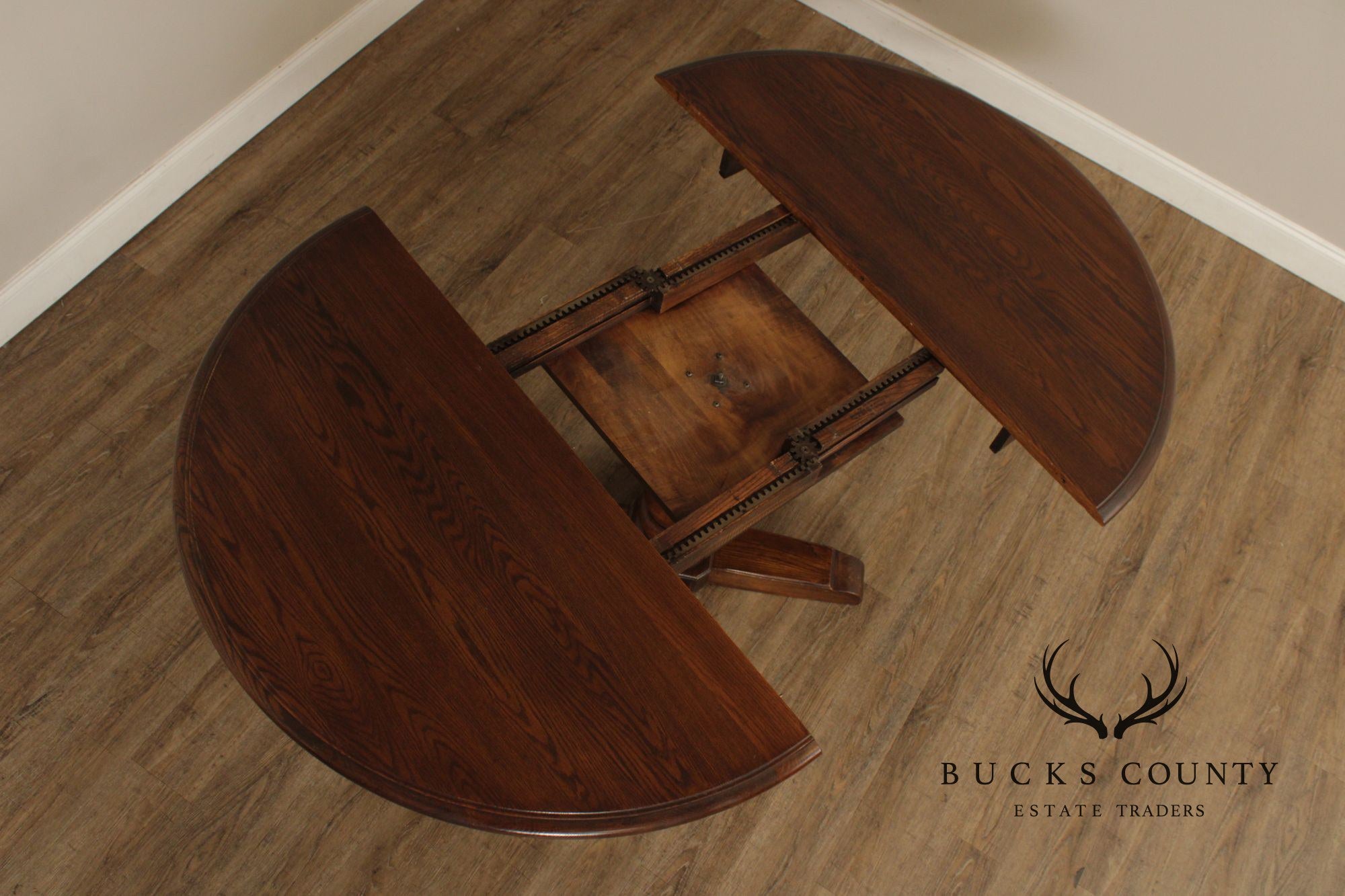 Conant Ball Round Oak Single Pedestal Dining Table With Two Leaves