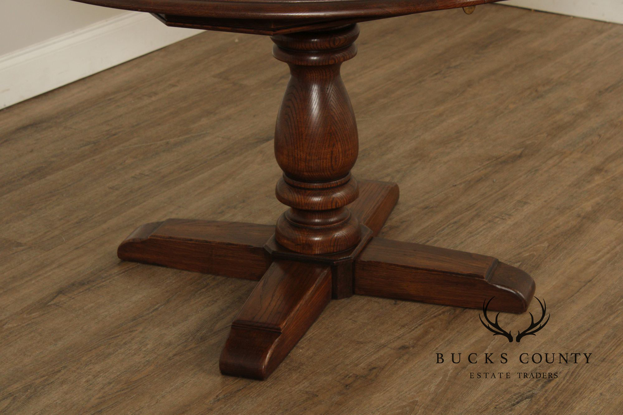 Conant Ball Round Oak Single Pedestal Dining Table With Two Leaves