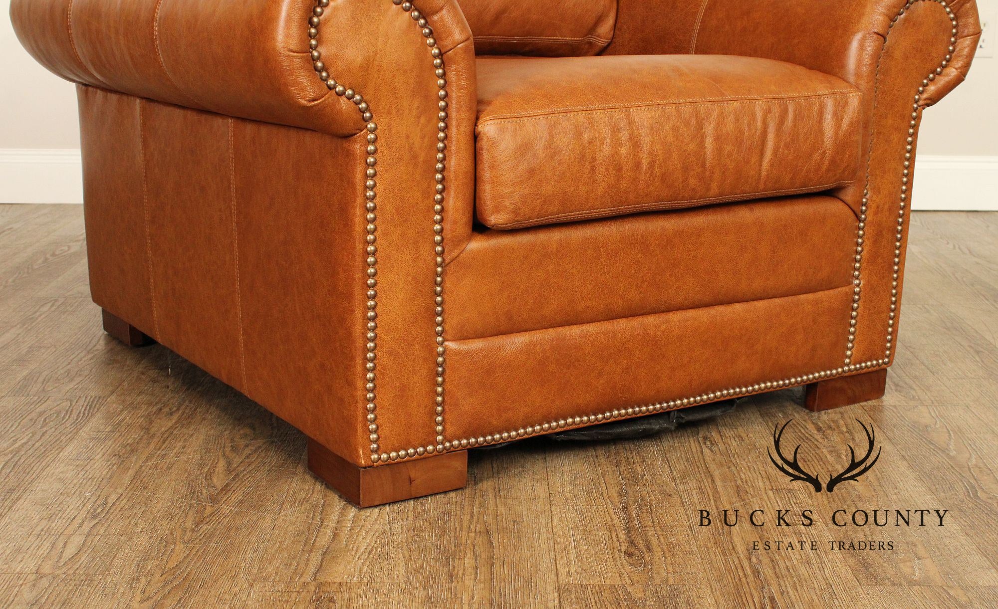 Leather Upholstered Chair & Ottoman