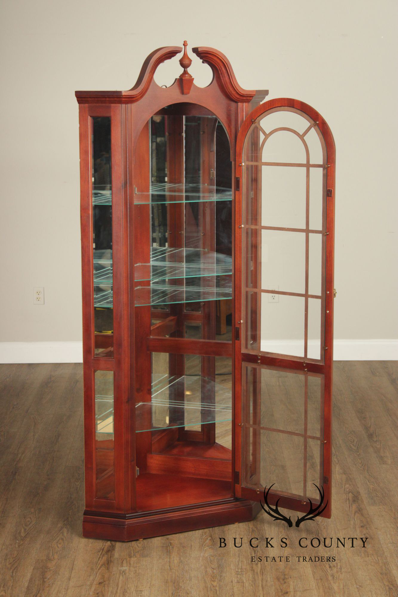Pulaski Traditional Lighted Cherry Corner Curio Cabinet With Arched Pediment