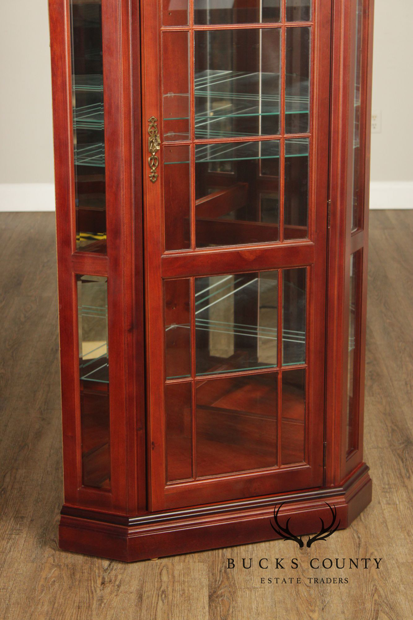 Pulaski Traditional Lighted Cherry Corner Curio Cabinet With Arched Pediment