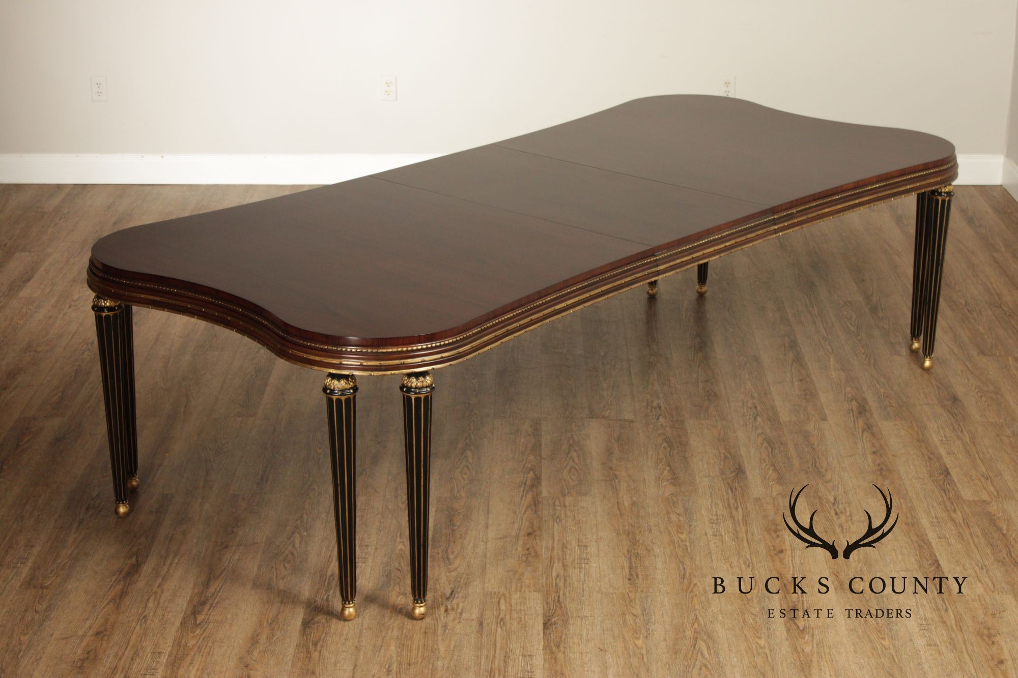EJ Victor Mahogany And Gilt Dining Table With One Leaf