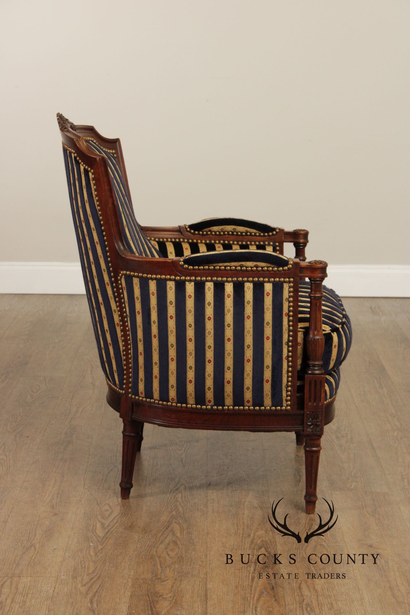 French Louis XVI Style Pair of Carved Walnut Bergere Armchairs