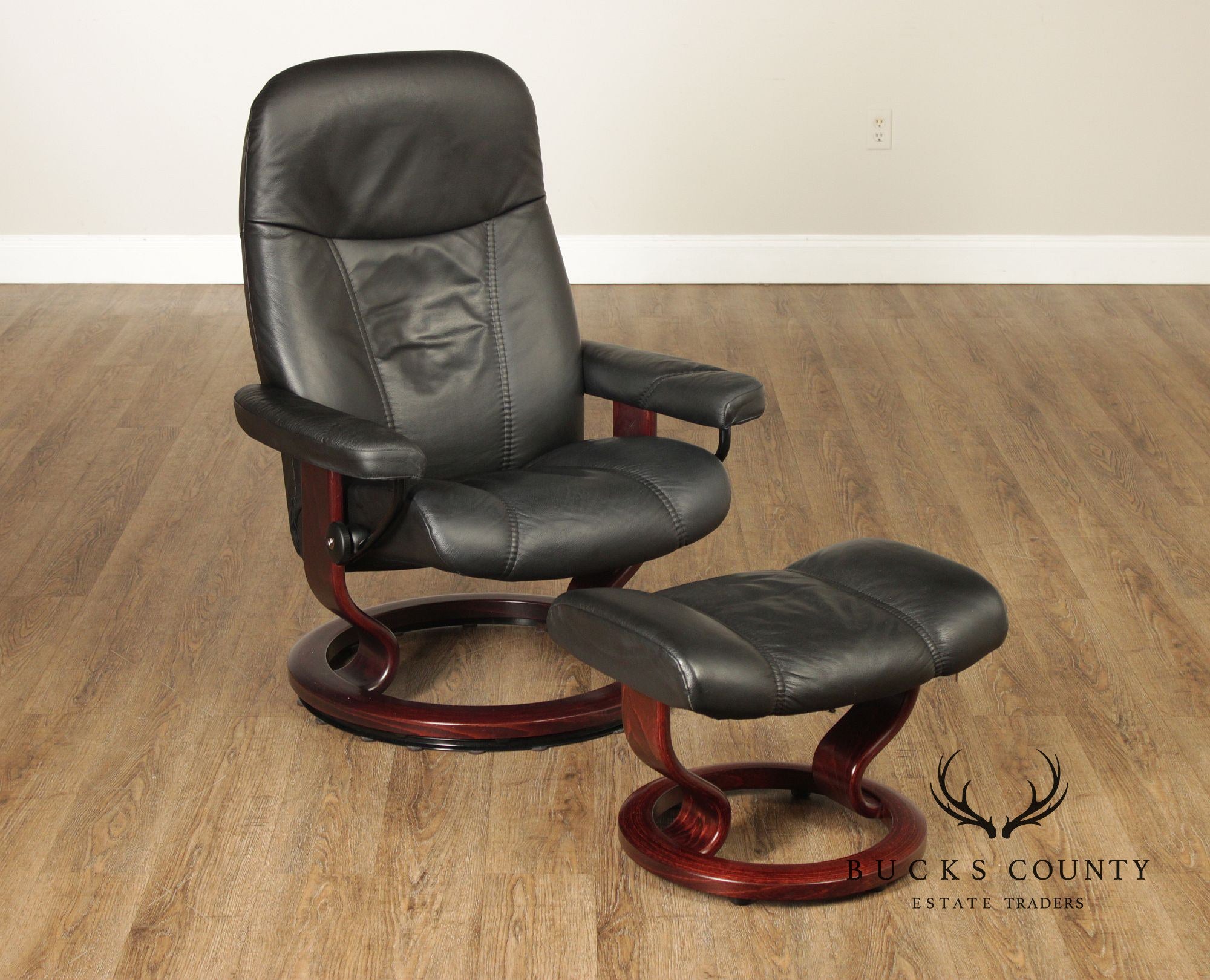 Ekornes Stressless Black Leather Recliner With Ottoman
