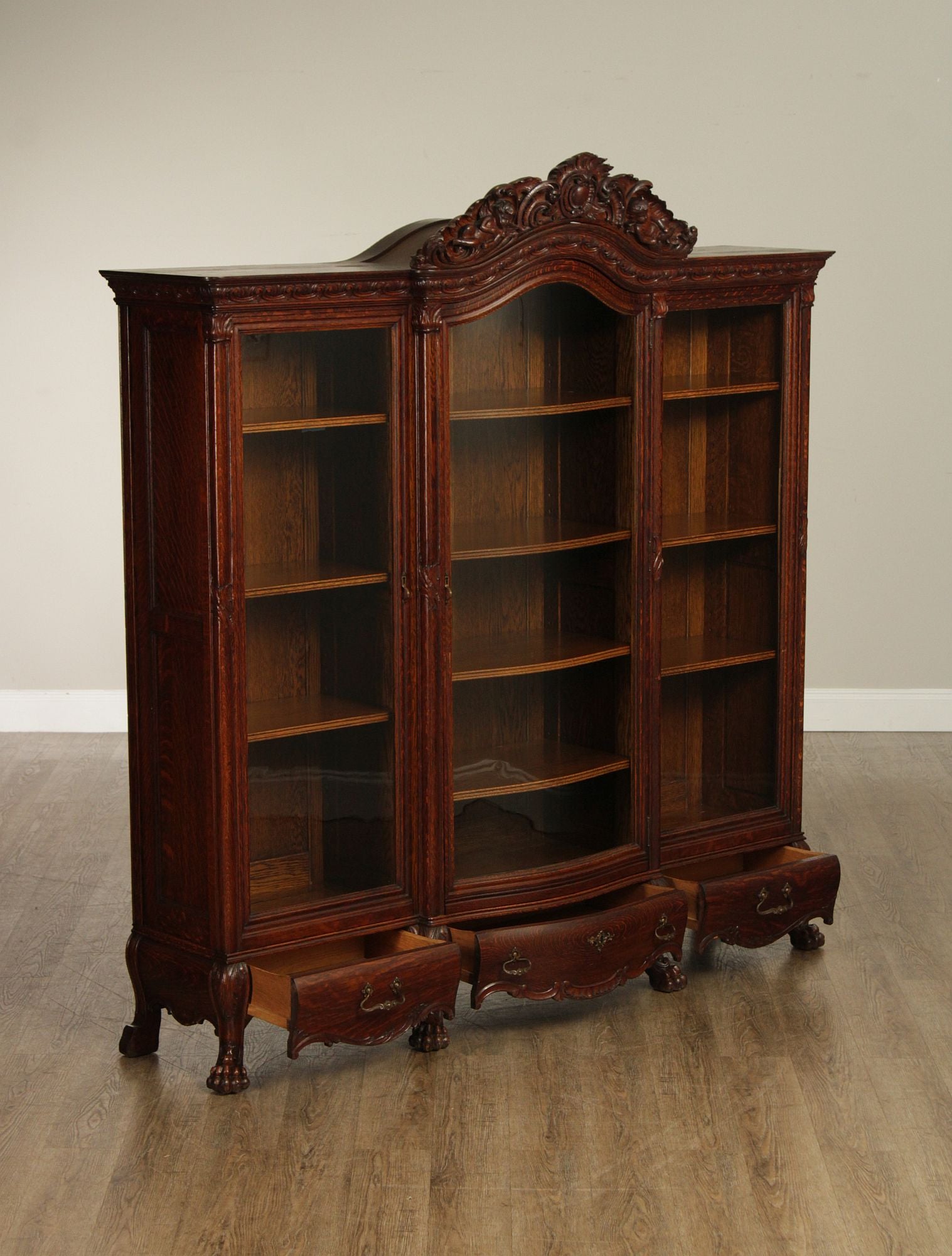 Antique Victorian Rococo Revival Oak Carved Glass Triple Door Bookcase