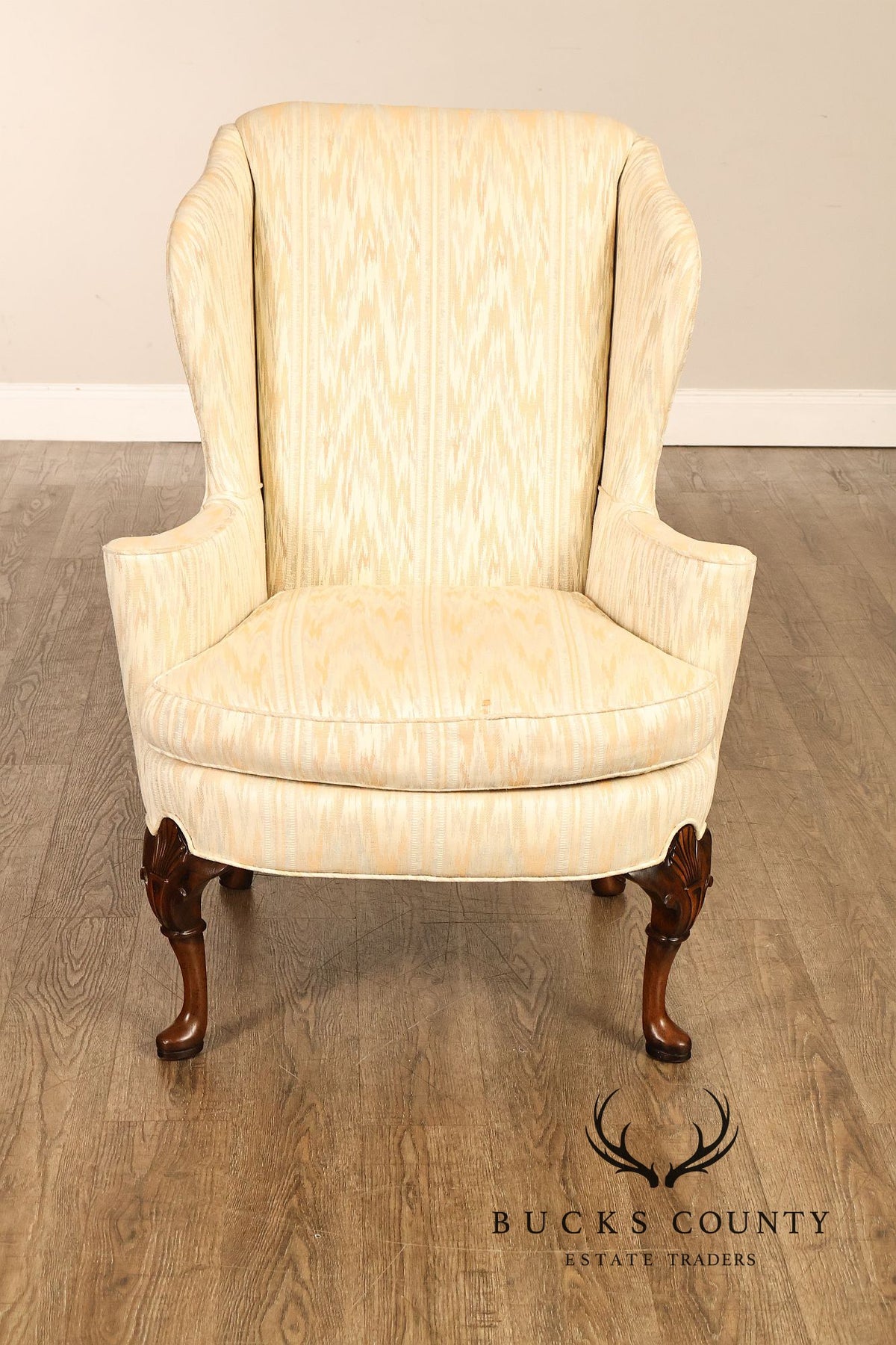 Traditional Upholstered Pair Of Wingback Armchairs With Carved Cabriole Legs