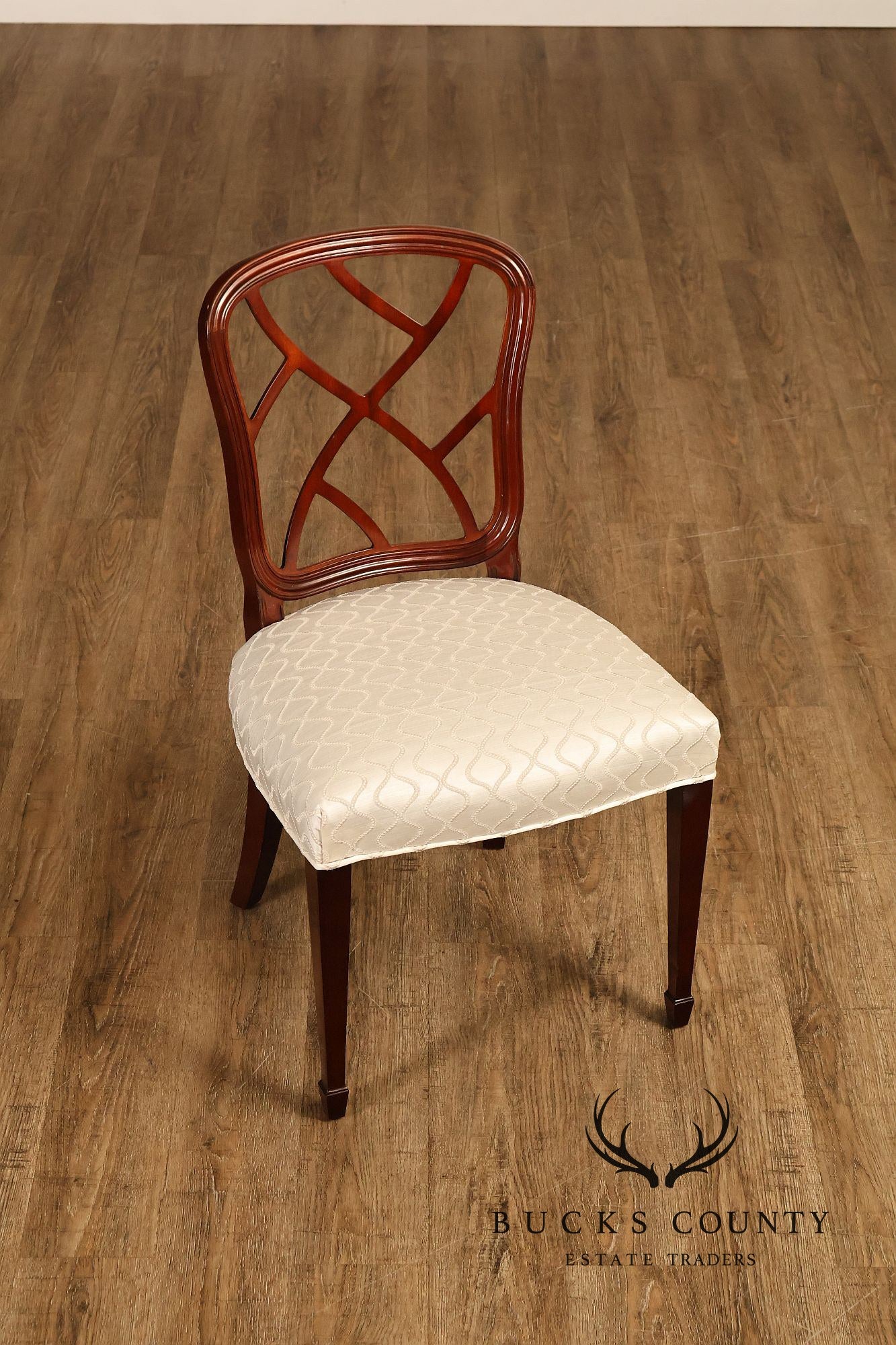 Kindel Set of Four Mahogany 'Hepplewhite' Dining Chairs