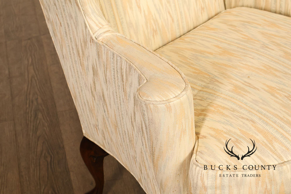 Traditional Upholstered Pair Of Wingback Armchairs With Carved Cabriole Legs