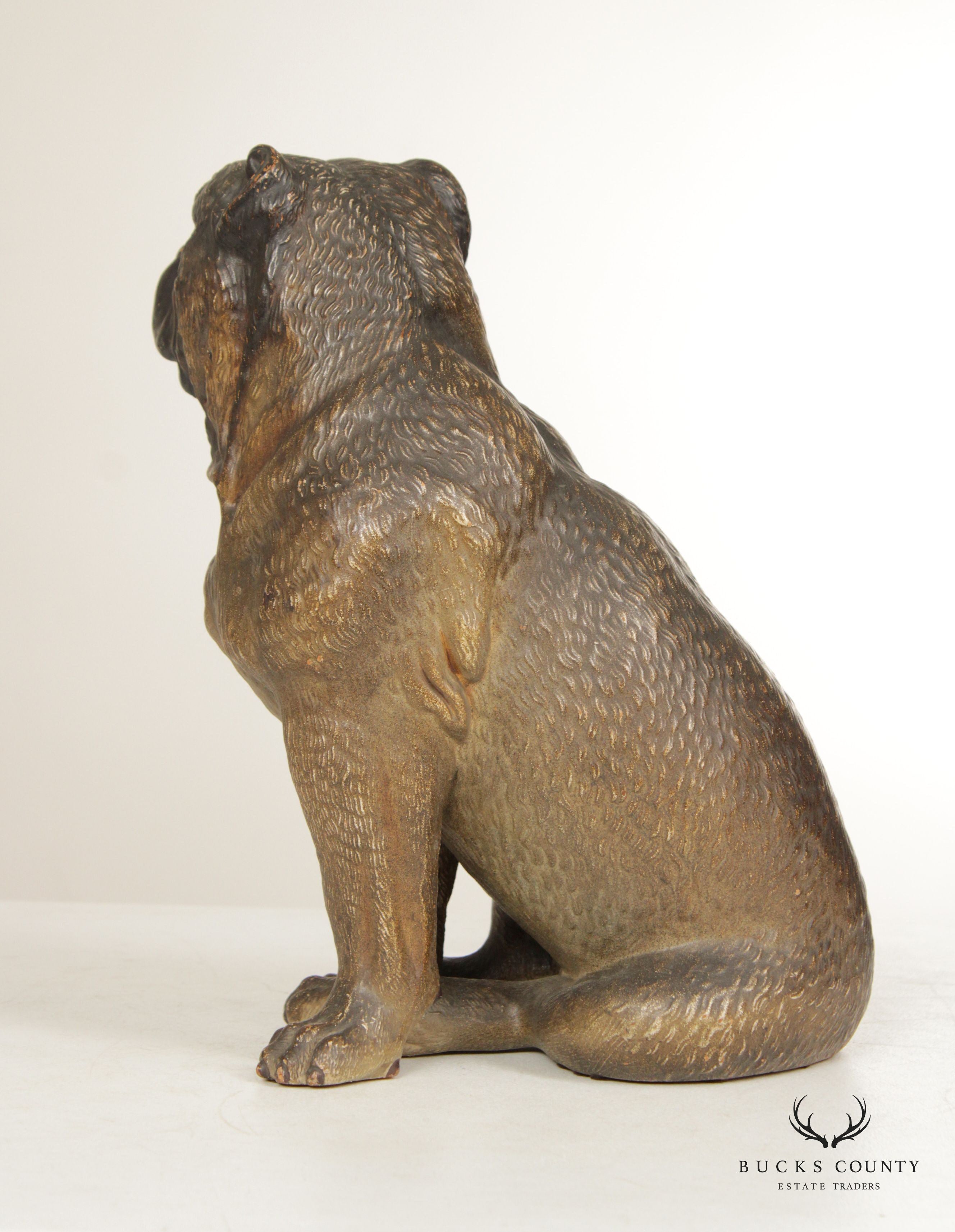 TERRA COTTA SITTING PUG DOG STATUE ATTRIBUTED TO GOLDSCHEIDER