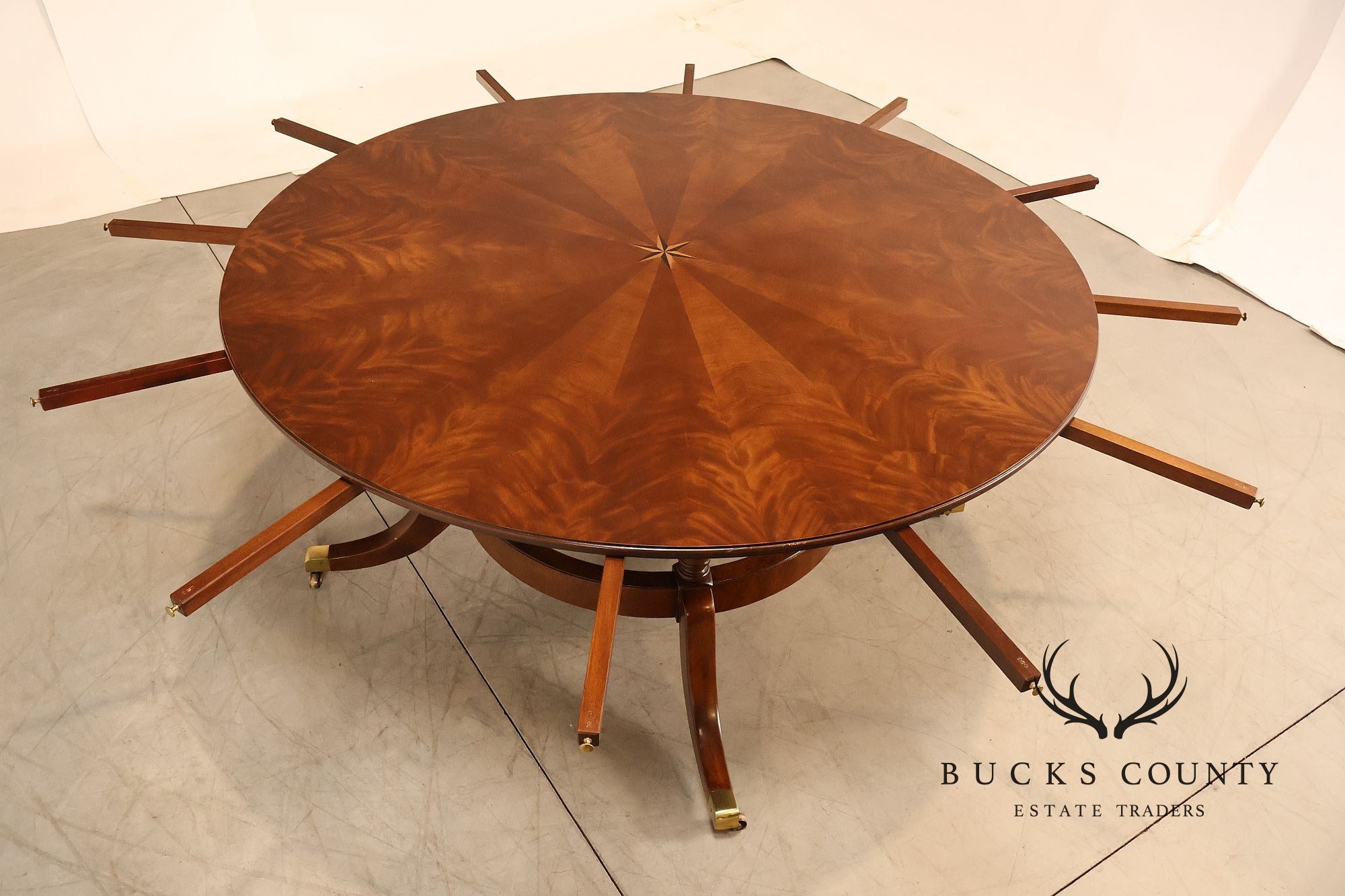 E.J. Victor Regency Style Round Inlaid Mahogany Pedestal Dining Table