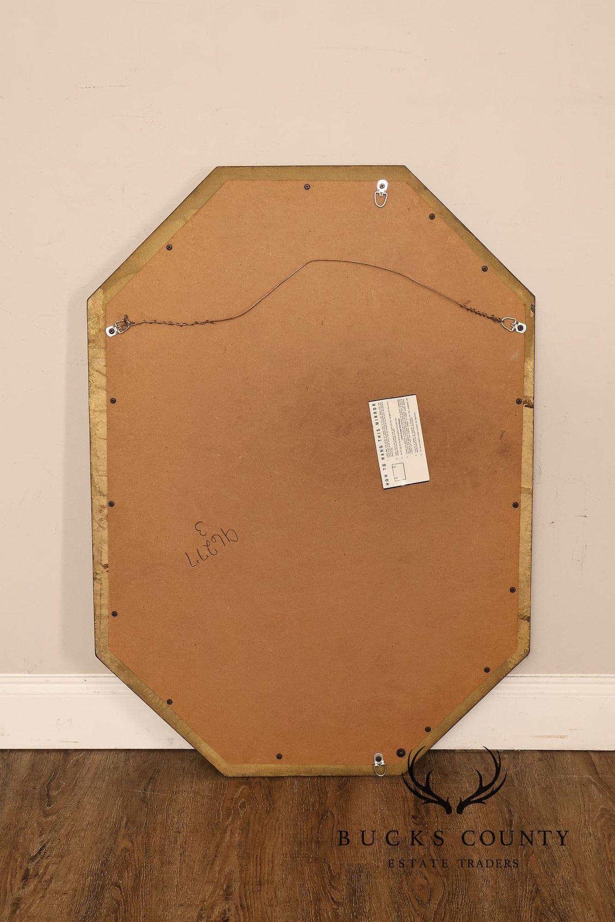 Traditional Octagonal Black And Gilt Beveled Wall Mirror