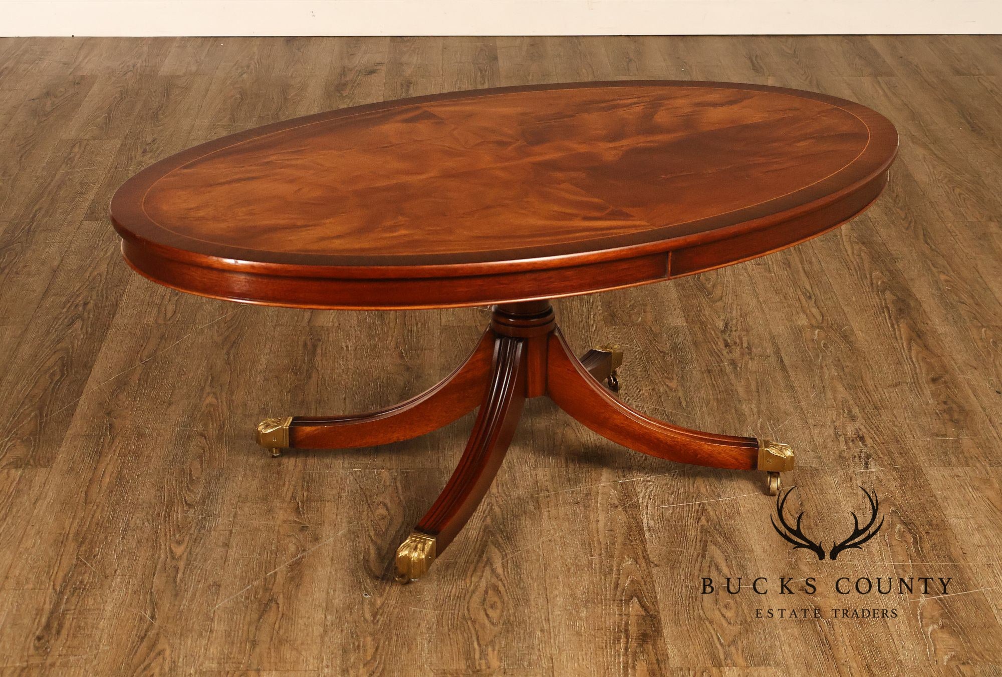 Regency Style Flame Mahogany Oval Top Coffee Table