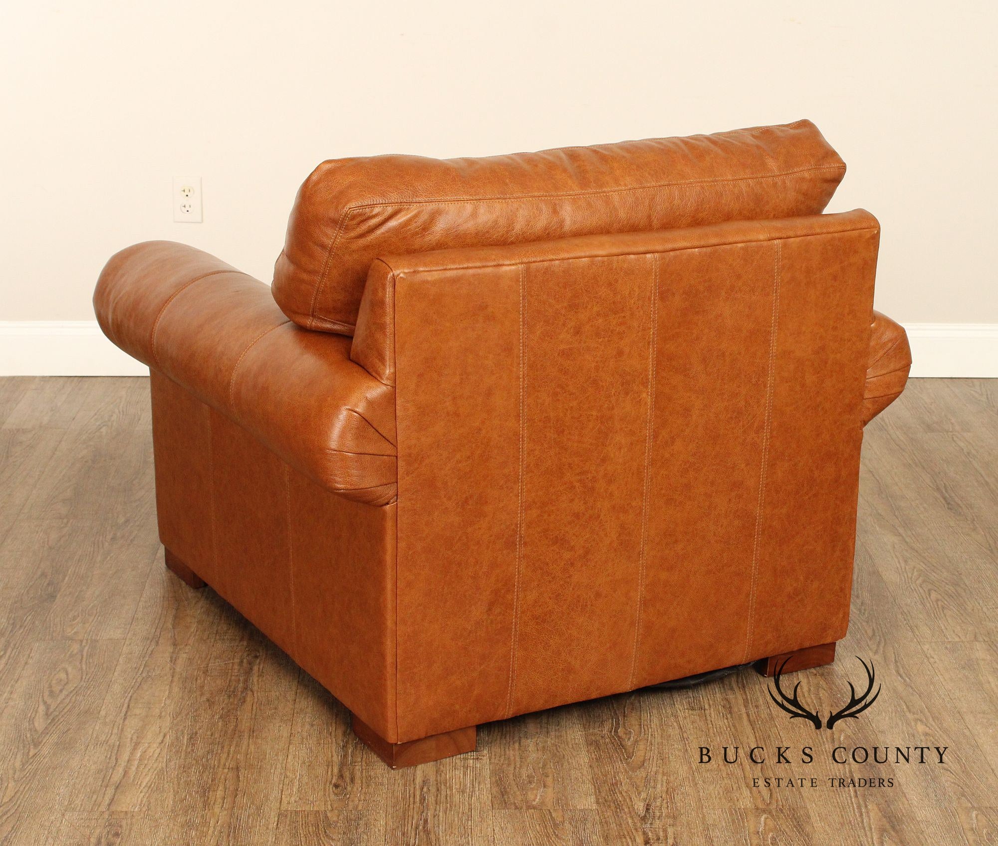 Leather Upholstered Chair & Ottoman