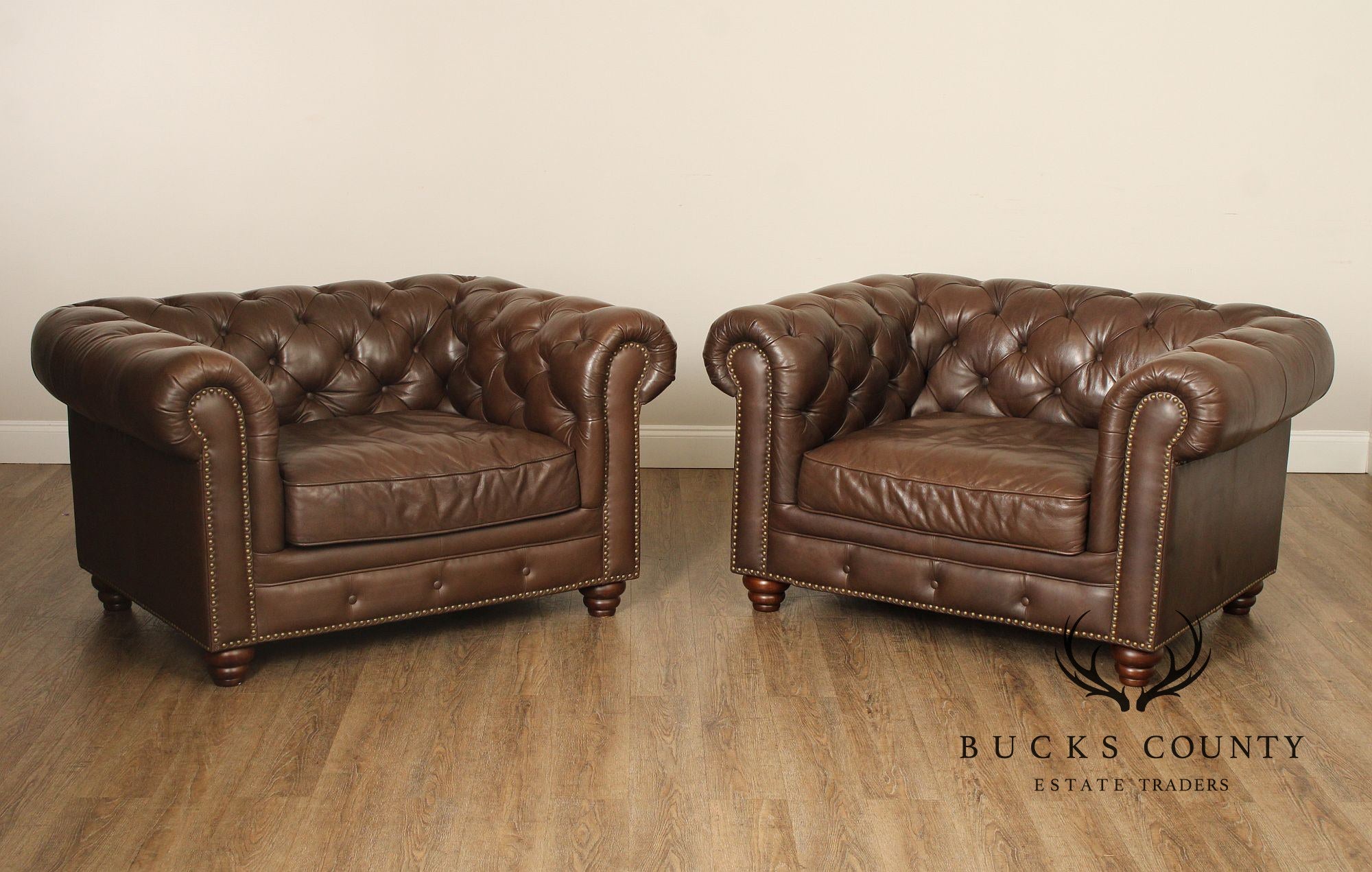 English Traditional Style Pair of Tufted Leather Chesterfield Wide Seat Club Chairs