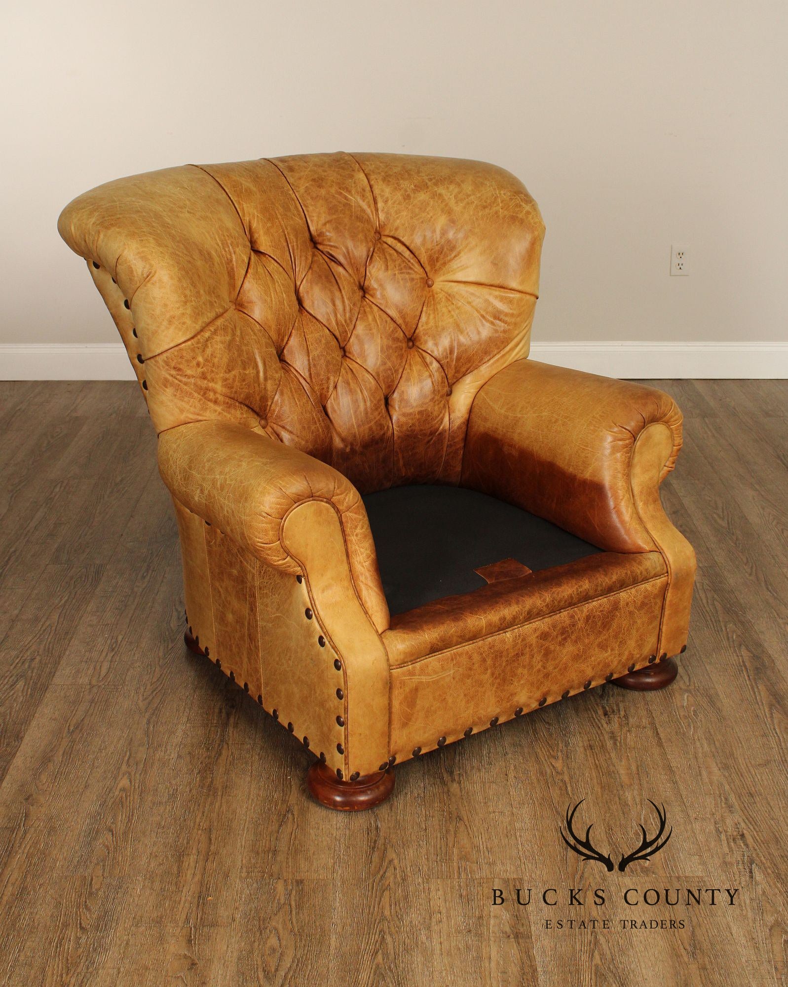 English Traditional Style Pair of Tufted Leather Armchairs and Ottoman