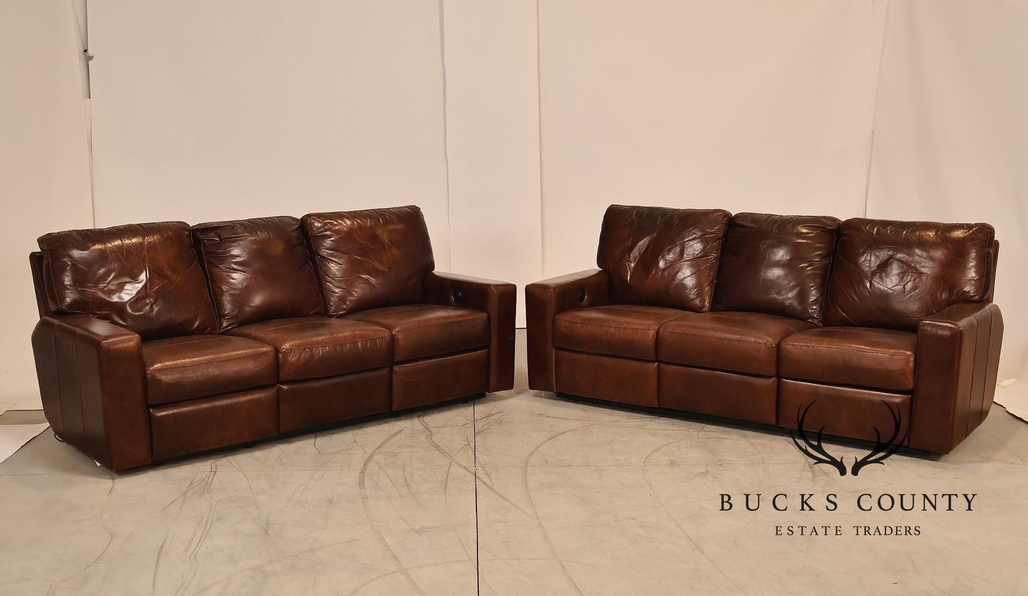 Soft Line Pair of 'Energia' Leather Power Reclining Sofas