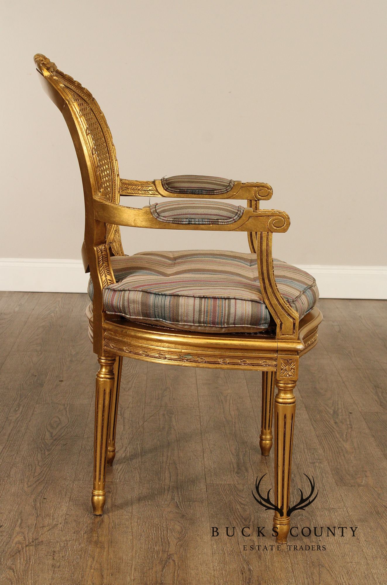 Decorative Crafts, Inc. Pair of French Louis XVI Style Caned Giltwood Fauteuil Armchairs