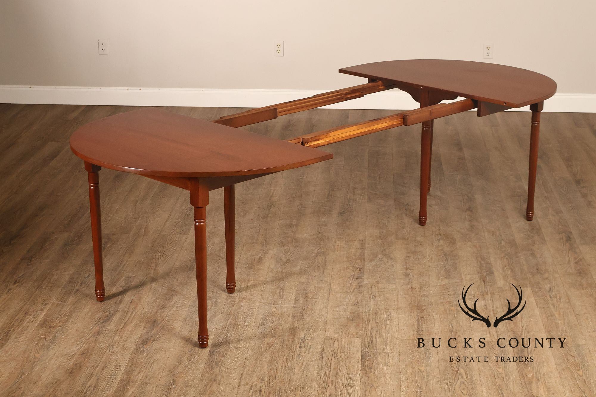 E. A. Clore Custom Walnut Extendable Dining Table With Four Leaves