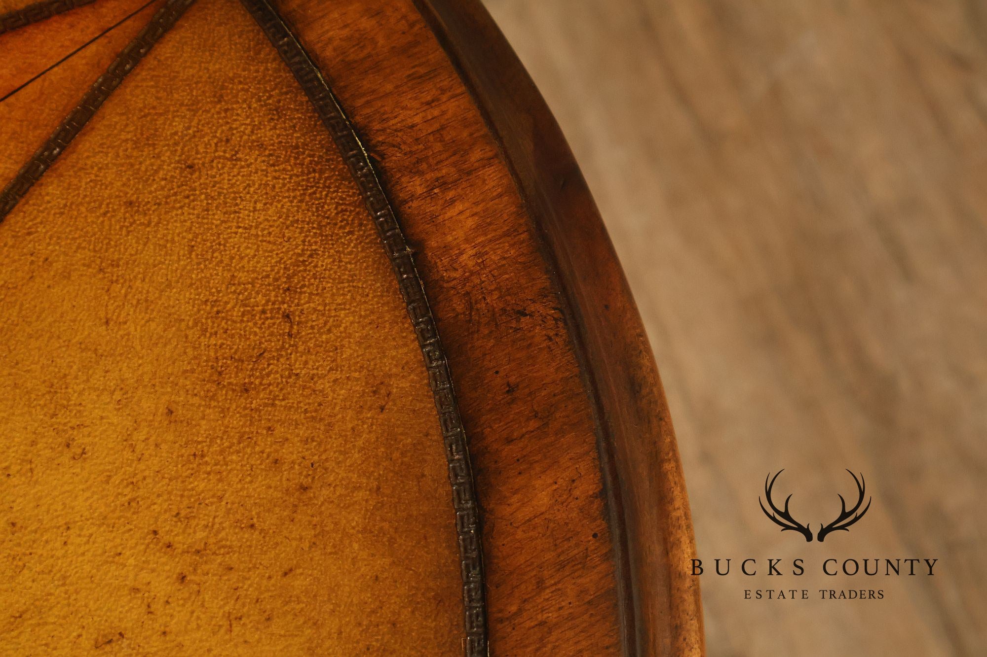 John Richard 'European Crossroads' Pair of Round Leather Top Lamp Tables