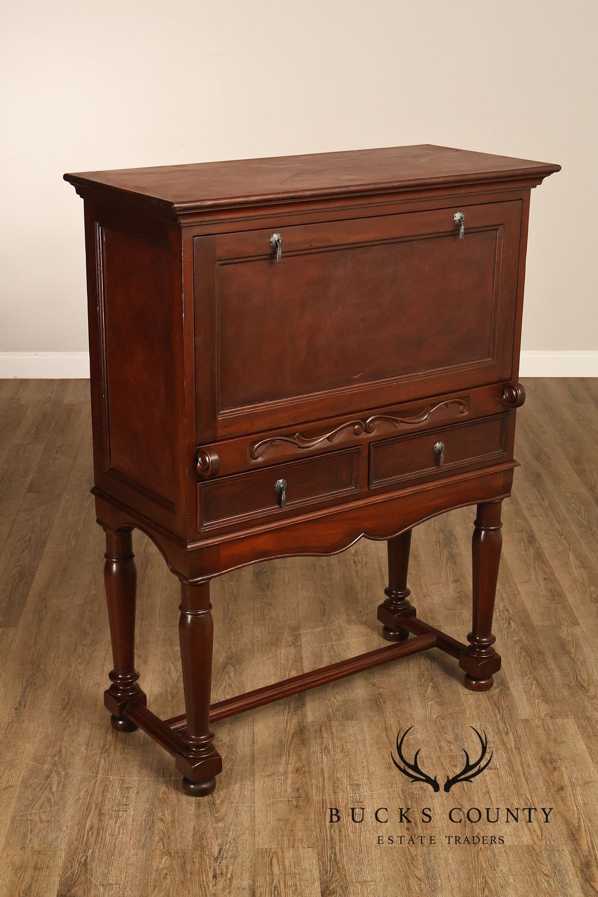 Traditional English Style Drop Front Bar Cabinet With A Stretcher Base