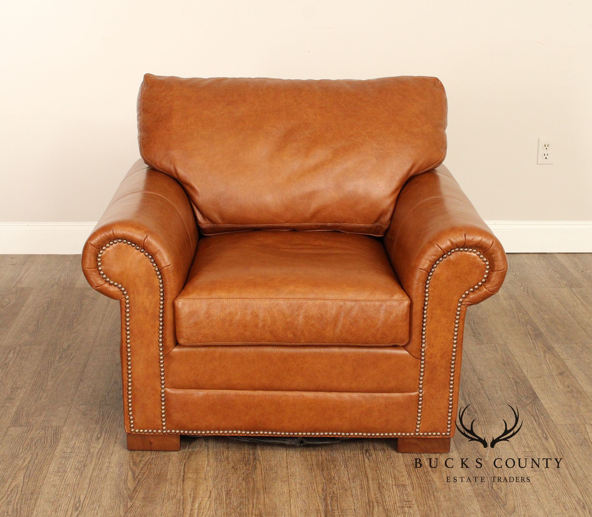 Leather Upholstered Chair & Ottoman