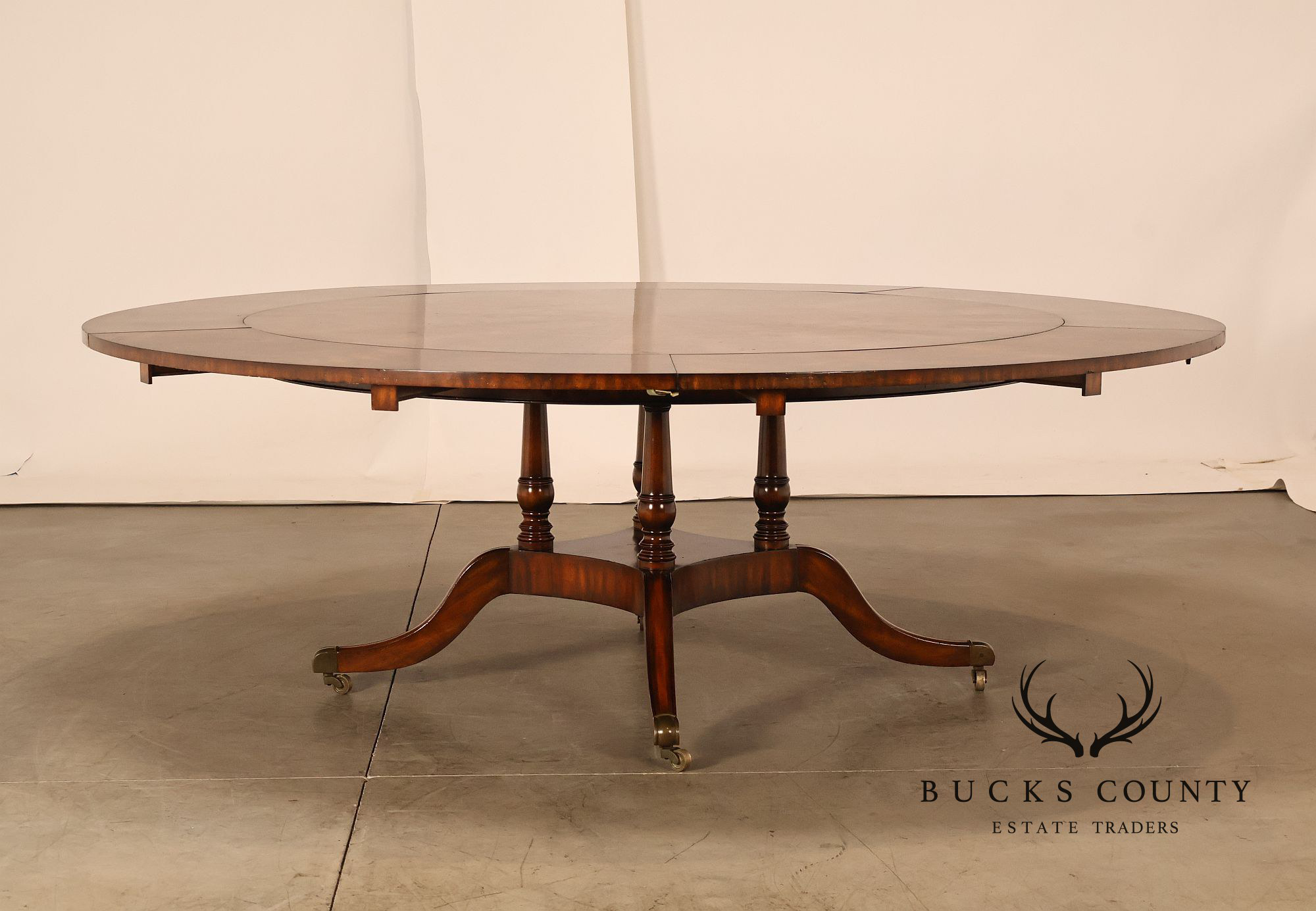 Maitland Smith 'Roundabout' Mahogany Expandable Dining Table