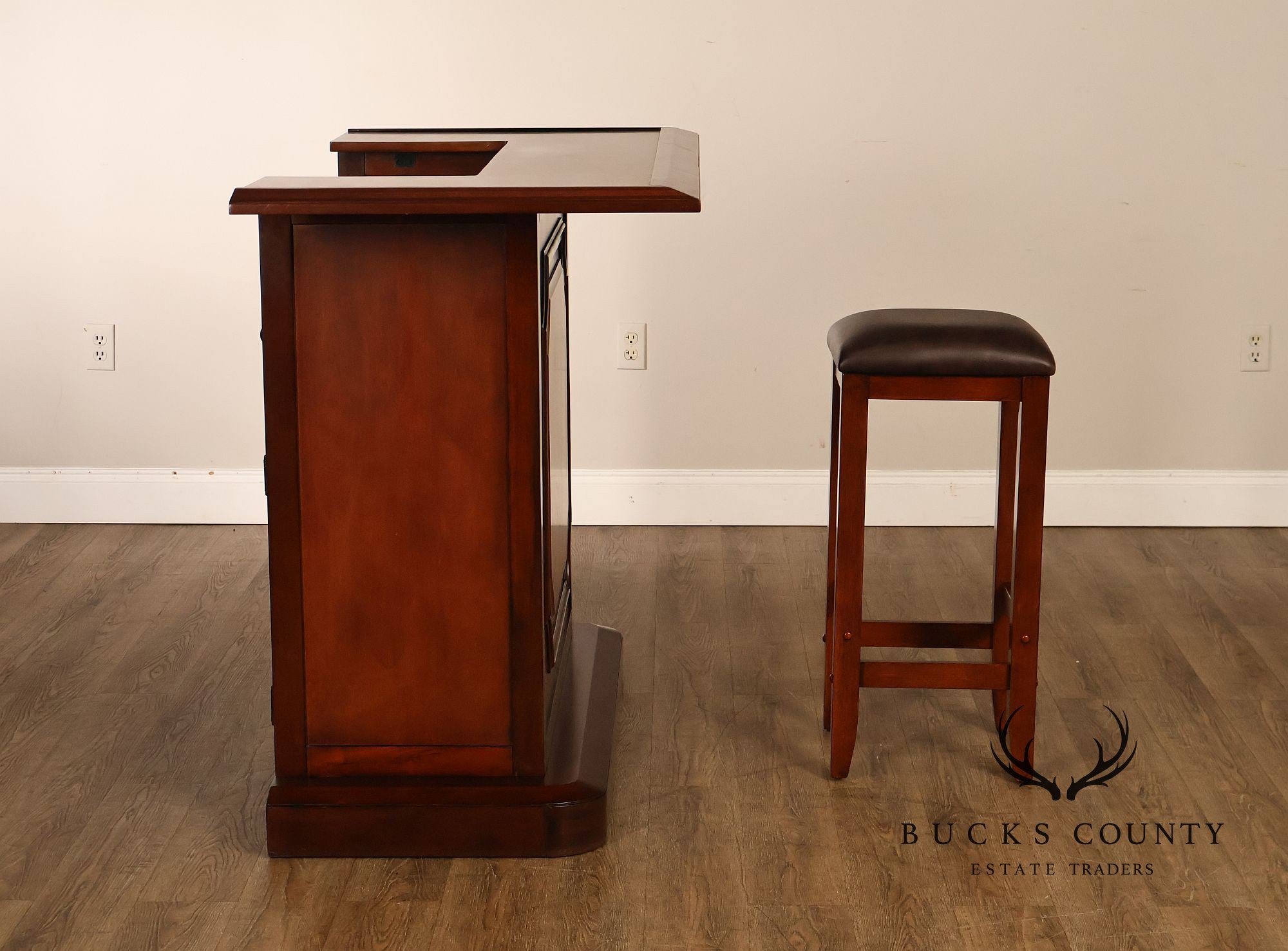 Traditional Home Bar With Wine Storage And Two Bar Stools