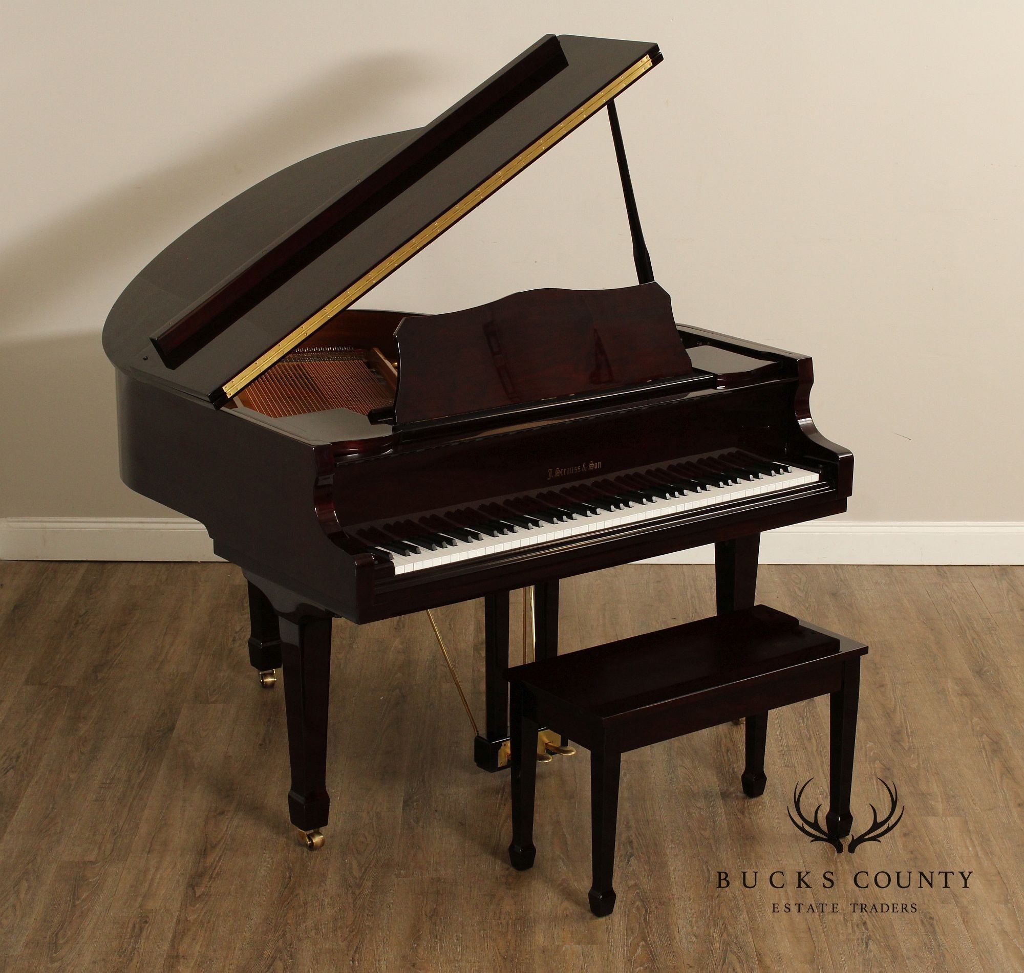 J. Strauss & Son Lacquered Mahogany Baby Grand Piano With Bench