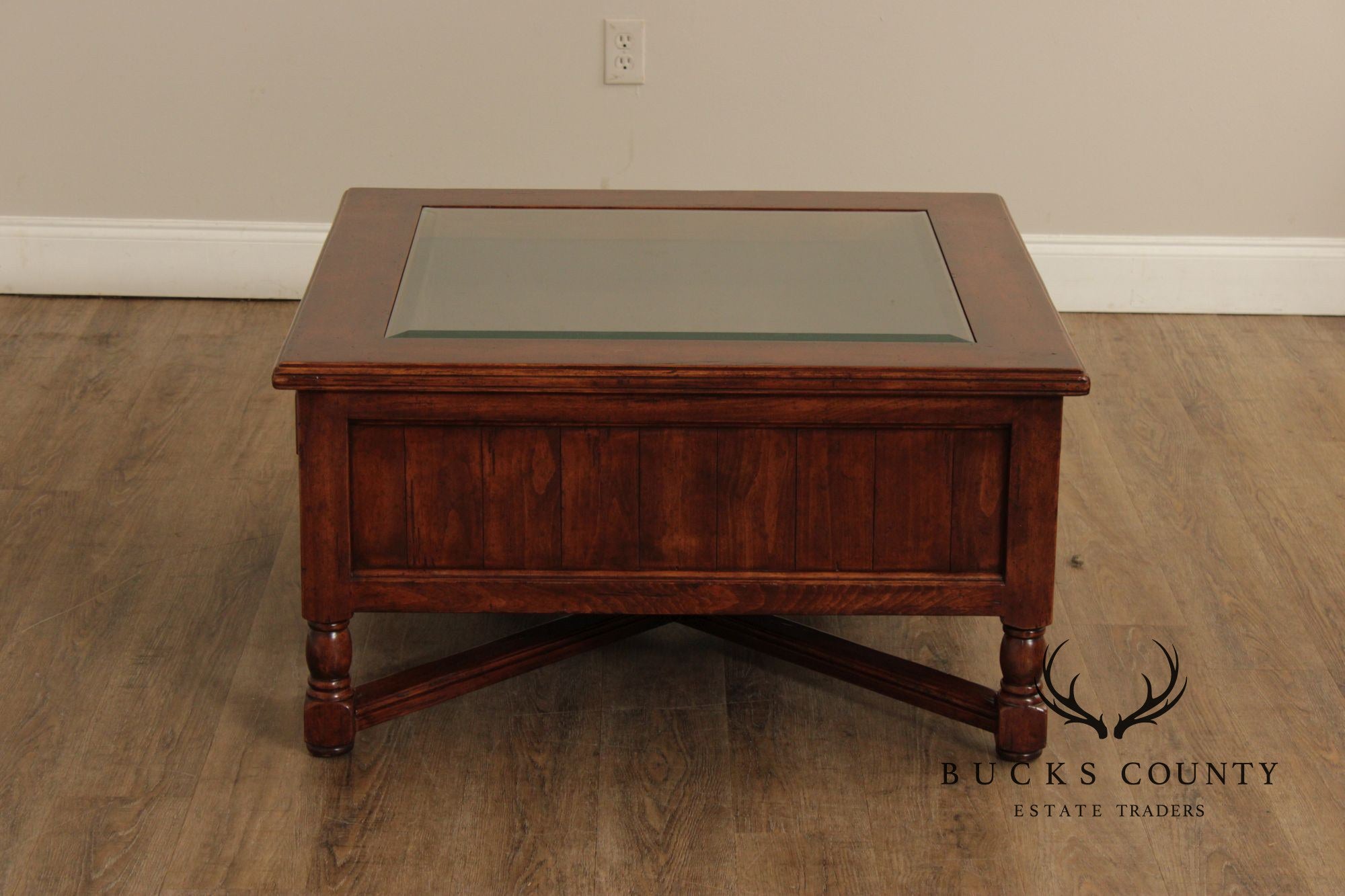 Bausman & Co. Glass Top Storage Coffee Table