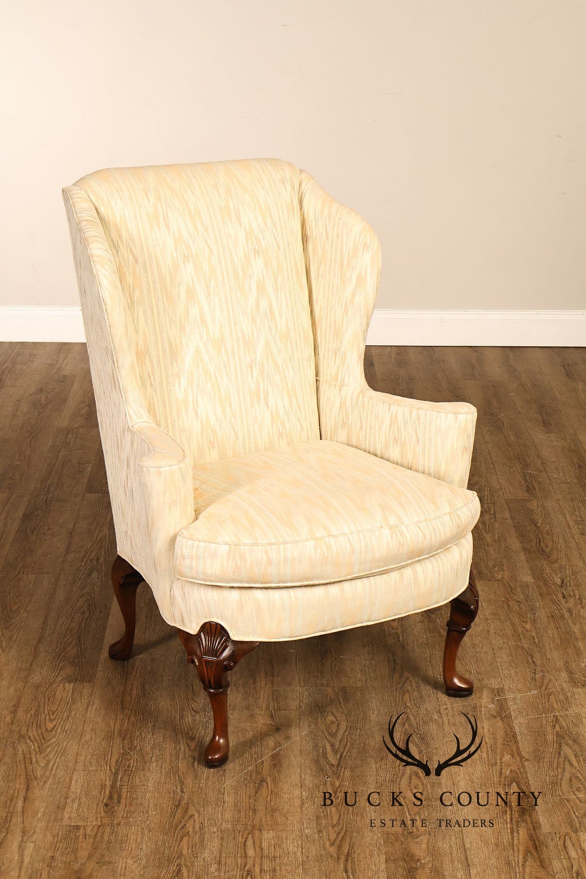 Traditional Upholstered Pair Of Wingback Armchairs With Carved Cabriole Legs