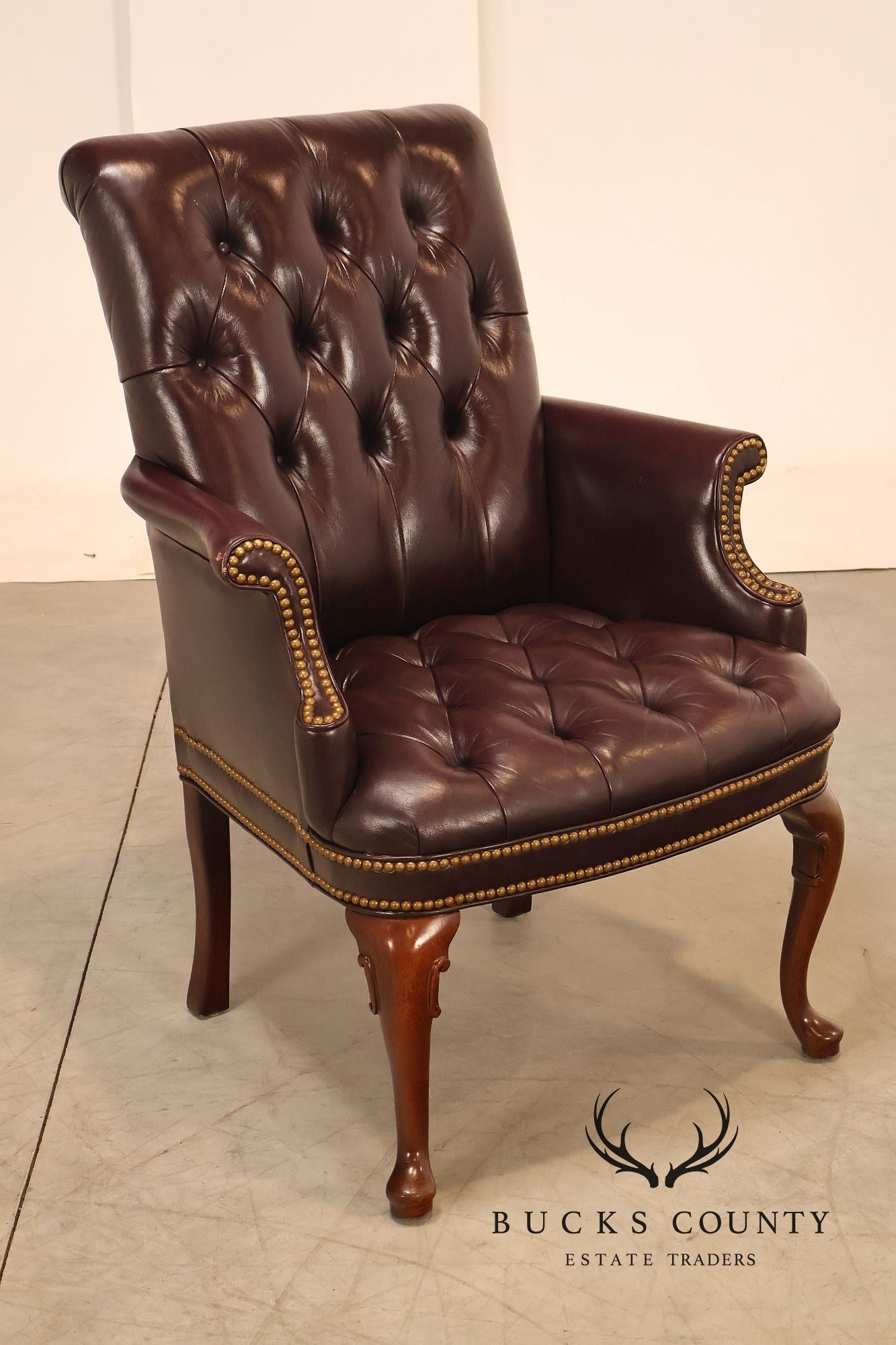 Hancock & Moore Pair of Tufted Leather and Mahogany Armchairs