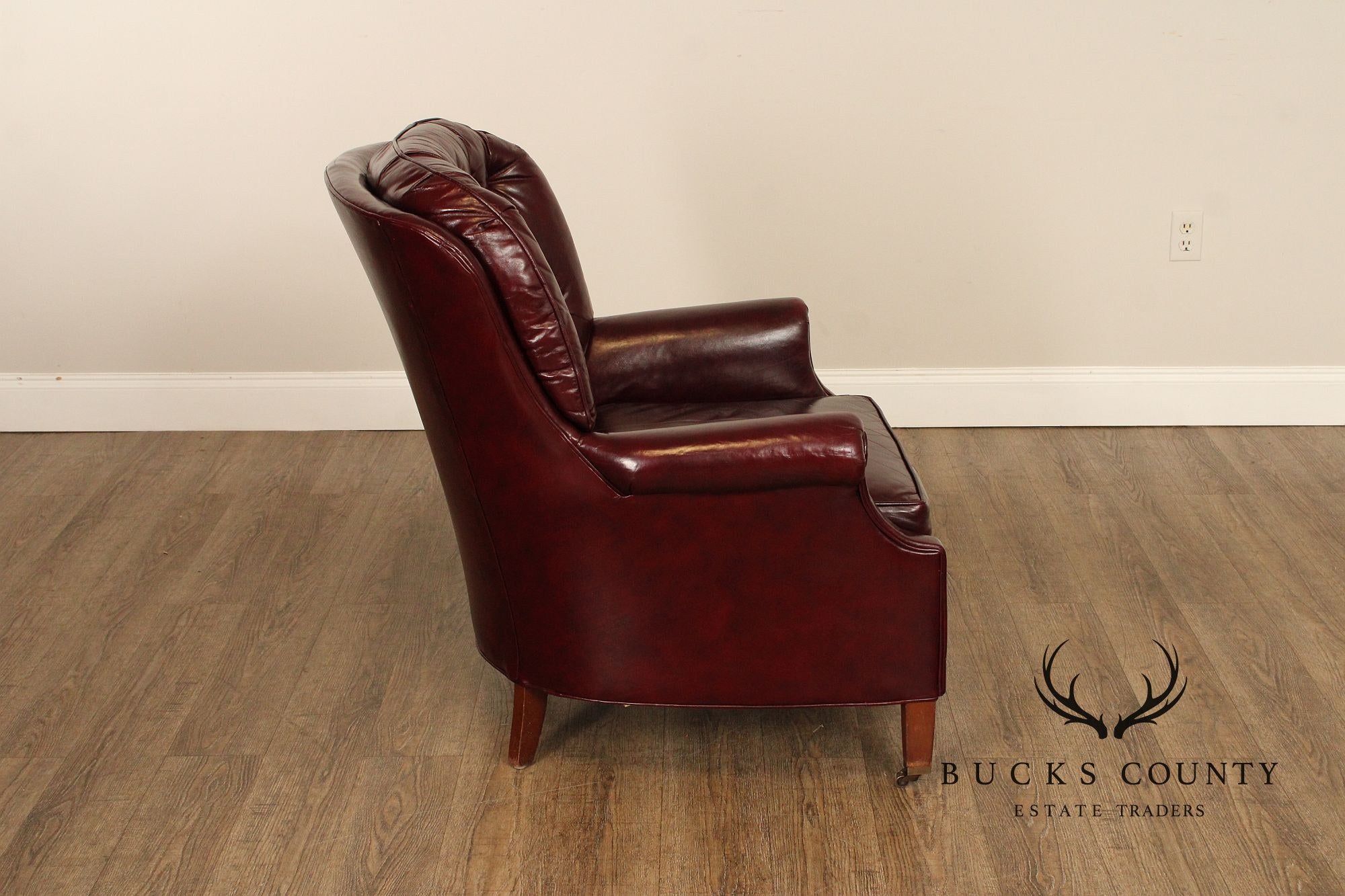 NORTH HICKORY OXBLOOD TUFTED LEATHER CHAIR AND OTTOMAN