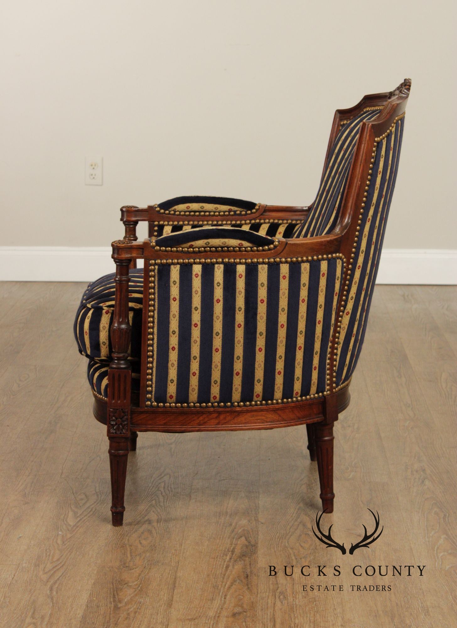 French Louis XVI Style Pair of Carved Walnut Bergere Armchairs