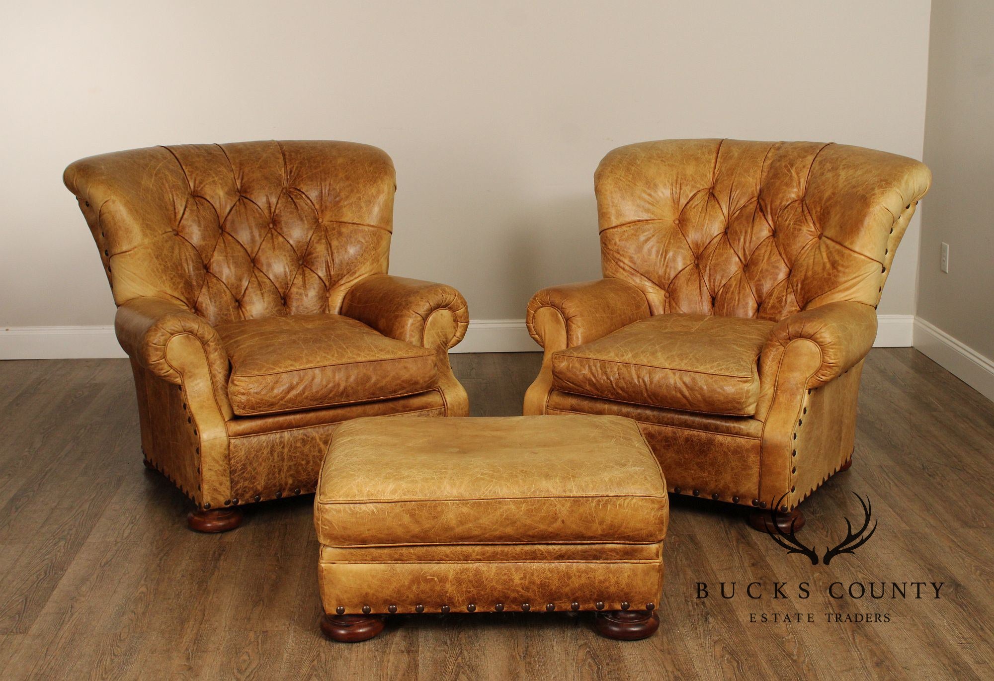 English Traditional Style Pair of Tufted Leather Armchairs and Ottoman