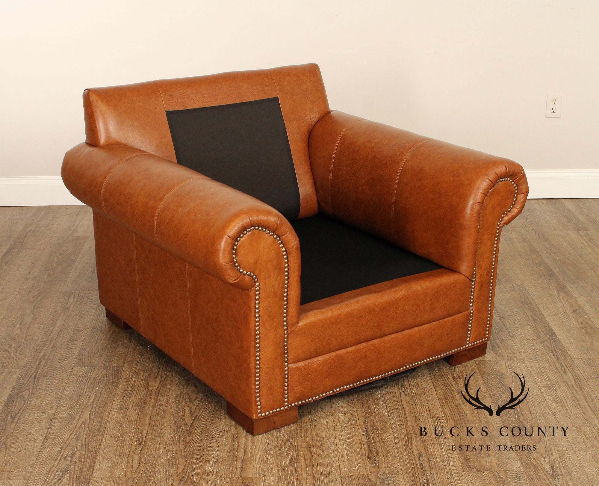 Leather Upholstered Chair & Ottoman