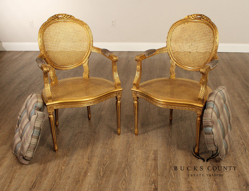 Decorative Crafts, Inc. Pair of French Louis XVI Style Caned Giltwood Fauteuil Armchairs